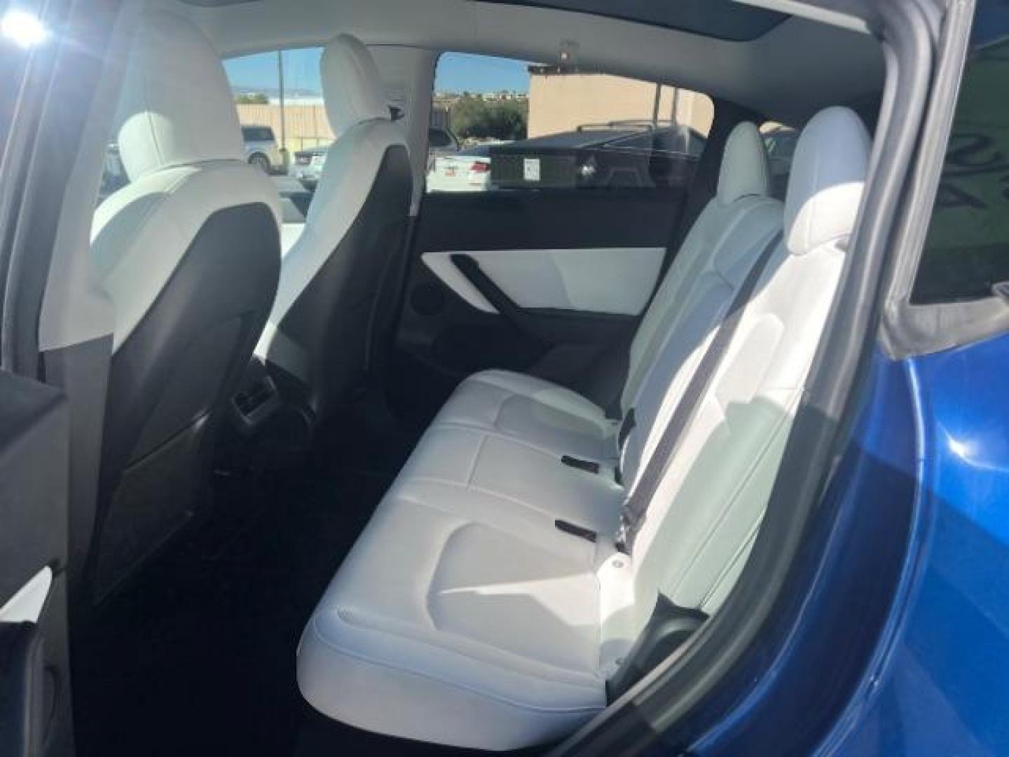 2021 Deep Blue Metallic /Black Tesla Model Y Long Range Dual Motor All-Wheel Drive (5YJYGDEE2MF) with an Electric engine, AUTOMATIC transmission, located at 1865 East Red Hills Pkwy, St. George, 84770, (435) 628-0023, 37.120850, -113.543640 - Excellent Model Y in rare color combo blue on white. Gets 260 miles on full charge. Full battery and motor warranty up to 120k miles Financing for ALL credit types. Aftermarket battery warranty available. We are THE southern Utah Tesla Experts. Call or text for more info - Photo#21