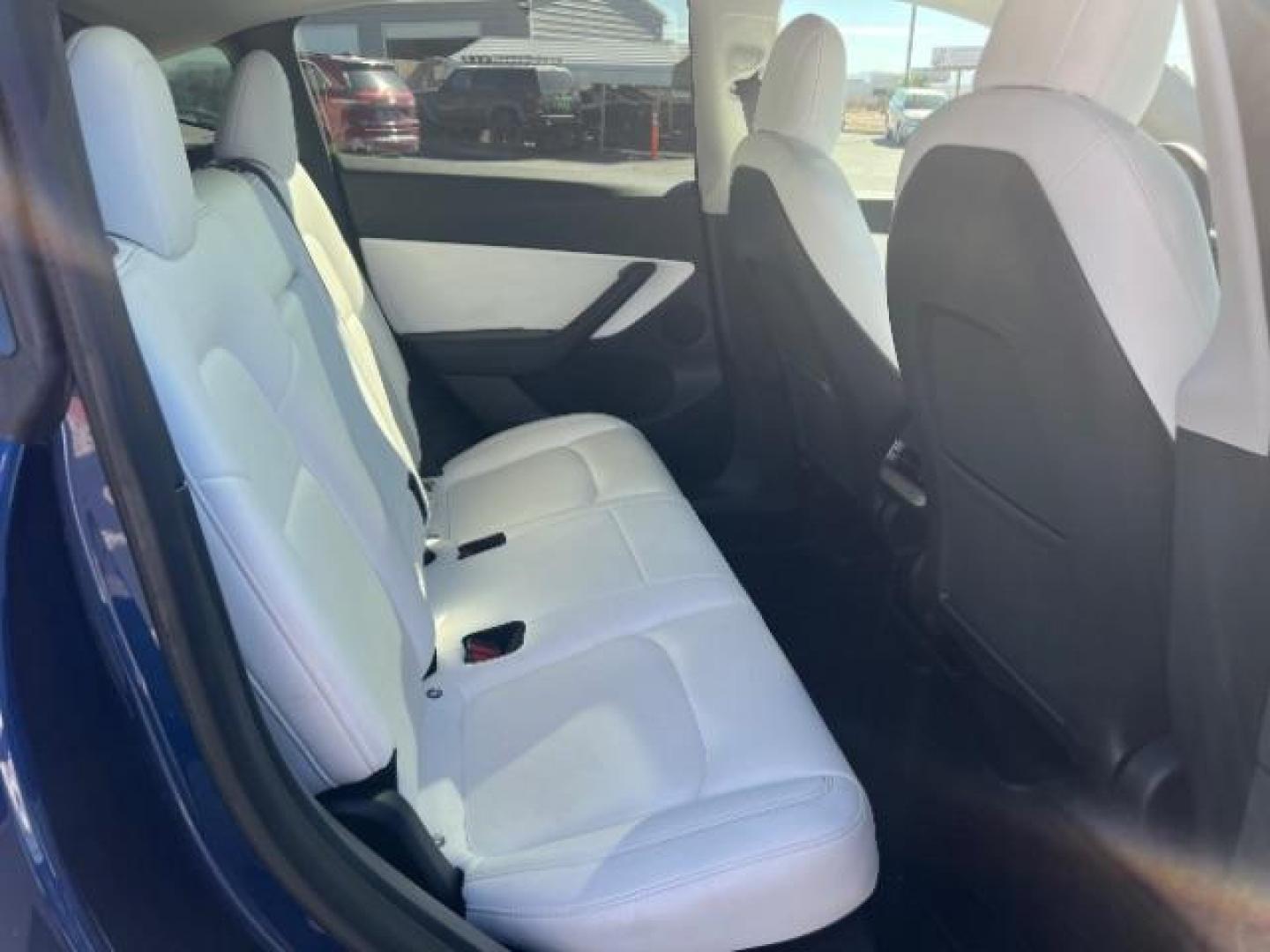 2021 Deep Blue Metallic /Black Tesla Model Y Long Range Dual Motor All-Wheel Drive (5YJYGDEE2MF) with an Electric engine, AUTOMATIC transmission, located at 1865 East Red Hills Pkwy, St. George, 84770, (435) 628-0023, 37.120850, -113.543640 - Excellent Model Y in rare color combo blue on white. Gets 260 miles on full charge. Full battery and motor warranty up to 120k miles Financing for ALL credit types. Aftermarket battery warranty available. We are THE southern Utah Tesla Experts. Call or text for more info - Photo#26