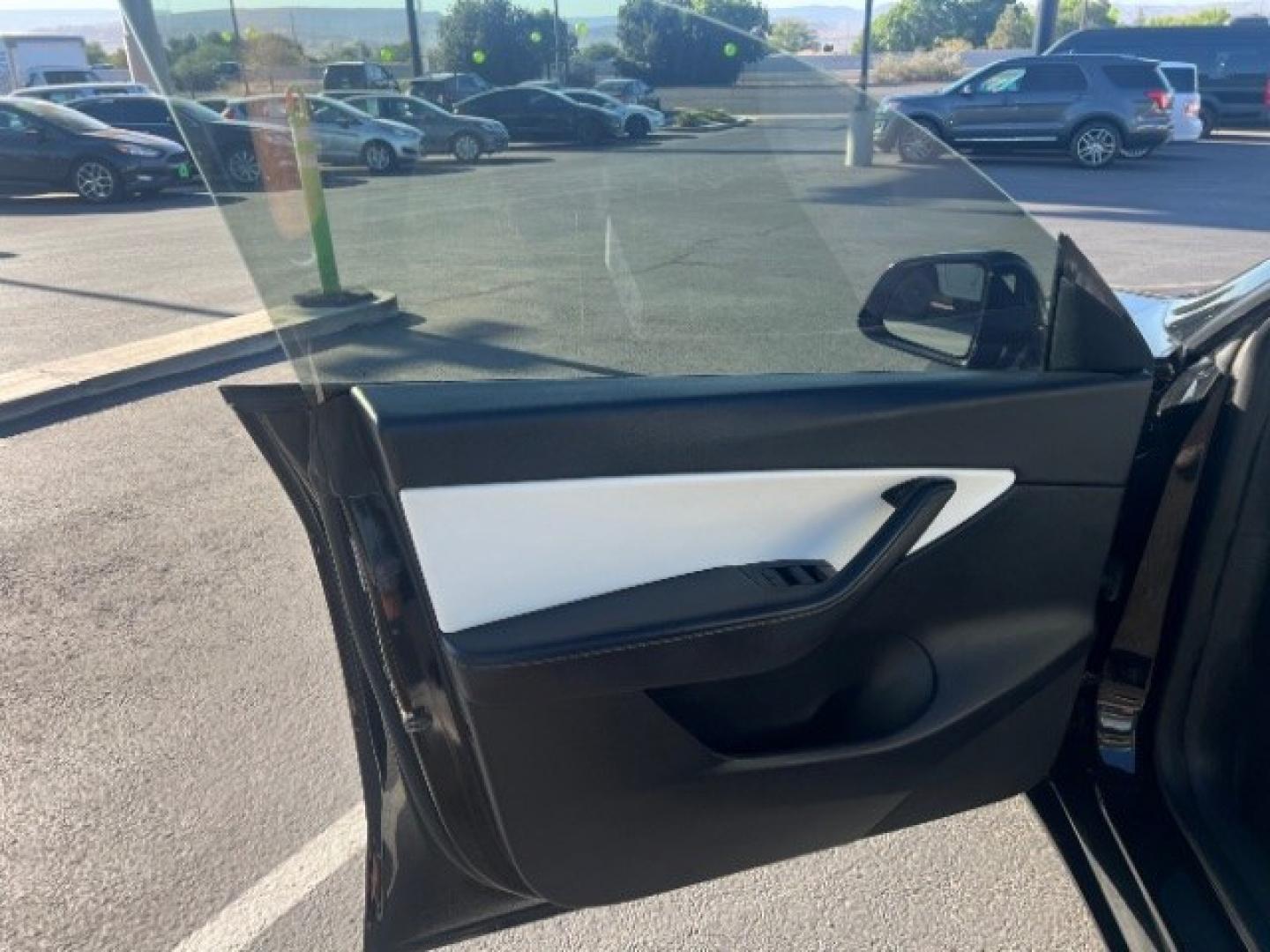 2020 Solid Black /White/Black Tesla Model Y Long Range (5YJYGDEEXLF) with an ELECTRIC engine, Electric transmission, located at 1865 East Red Hills Pkwy, St. George, 84770, (435) 628-0023, 37.120850, -113.543640 - Excellent Tesla Model Y Long Range All Wheel Drive. 5 Seats HW3, Interior and exterior in great condition. Small scratches and dings as pictured. Every Tesla we sell has had cabin air filter replaced, radiator cleaned, fluids topped AND comes with a mobile charging kit! Battery is healthy and gets- Photo#14