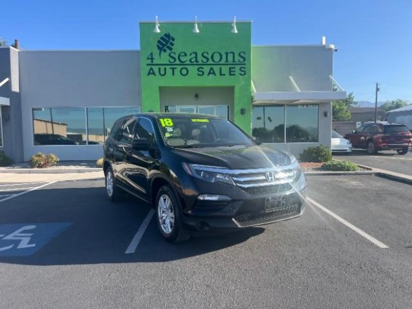 2018 Black Forest Pearl /Gray Honda Pilot LX (5FNYF5H13JB) with an 3.5L V-6 gasoline direct injection engine, AUTOMATIC transmission, located at 940 North Main Street, Cedar City, UT, 84720, (435) 628-0023, 37.692936, -113.061897 - We specialize in helping ALL people get the best financing available. No matter your credit score, good, bad or none we can get you an amazing rate. Had a bankruptcy, divorce, or repossessions? We give you the green light to get your credit back on the road. Low down and affordable payments that fit - Photo#0