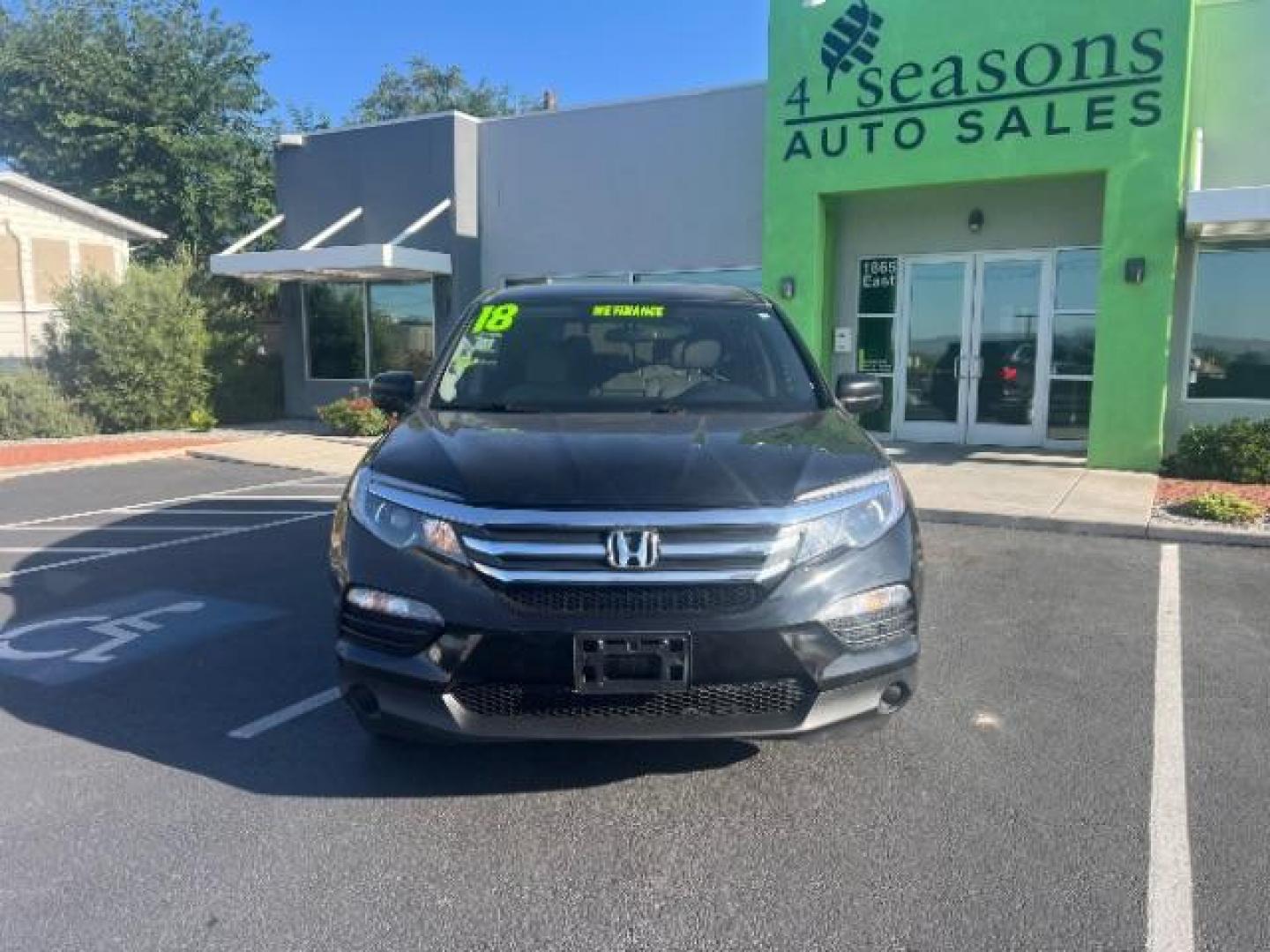 2018 Black Forest Pearl /Gray Honda Pilot LX (5FNYF5H13JB) with an 3.5L V-6 gasoline direct injection engine, AUTOMATIC transmission, located at 940 North Main Street, Cedar City, UT, 84720, (435) 628-0023, 37.692936, -113.061897 - We specialize in helping ALL people get the best financing available. No matter your credit score, good, bad or none we can get you an amazing rate. Had a bankruptcy, divorce, or repossessions? We give you the green light to get your credit back on the road. Low down and affordable payments that fit - Photo#1