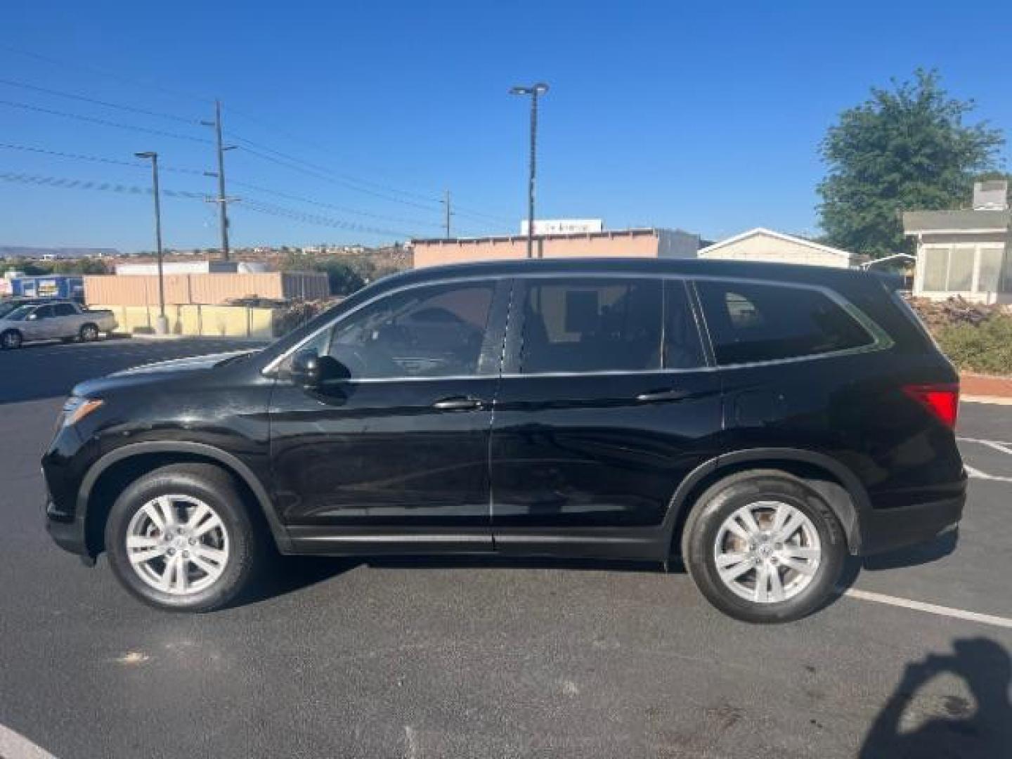 2018 Black Forest Pearl /Gray Honda Pilot LX (5FNYF5H13JB) with an 3.5L V-6 gasoline direct injection engine, AUTOMATIC transmission, located at 940 North Main Street, Cedar City, UT, 84720, (435) 628-0023, 37.692936, -113.061897 - We specialize in helping ALL people get the best financing available. No matter your credit score, good, bad or none we can get you an amazing rate. Had a bankruptcy, divorce, or repossessions? We give you the green light to get your credit back on the road. Low down and affordable payments that fit - Photo#3