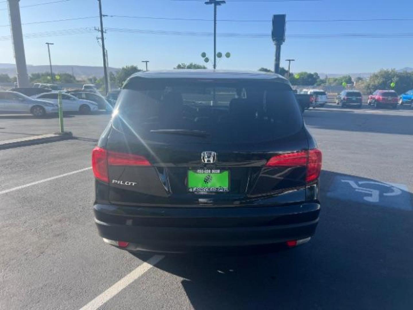 2018 Black Forest Pearl /Gray Honda Pilot LX (5FNYF5H13JB) with an 3.5L V-6 gasoline direct injection engine, AUTOMATIC transmission, located at 940 North Main Street, Cedar City, UT, 84720, (435) 628-0023, 37.692936, -113.061897 - We specialize in helping ALL people get the best financing available. No matter your credit score, good, bad or none we can get you an amazing rate. Had a bankruptcy, divorce, or repossessions? We give you the green light to get your credit back on the road. Low down and affordable payments that fit - Photo#5