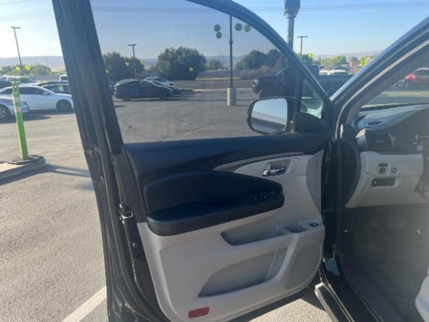 2018 Black Forest Pearl /Gray Honda Pilot LX (5FNYF5H13JB) with an 3.5L V-6 gasoline direct injection engine, AUTOMATIC transmission, located at 940 North Main Street, Cedar City, UT, 84720, (435) 628-0023, 37.692936, -113.061897 - We specialize in helping ALL people get the best financing available. No matter your credit score, good, bad or none we can get you an amazing rate. Had a bankruptcy, divorce, or repossessions? We give you the green light to get your credit back on the road. Low down and affordable payments that fit - Photo#12