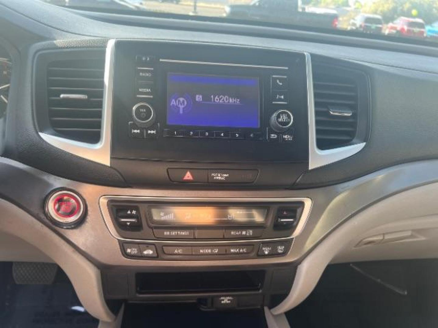 2018 Black Forest Pearl /Gray Honda Pilot LX (5FNYF5H13JB) with an 3.5L V-6 gasoline direct injection engine, AUTOMATIC transmission, located at 940 North Main Street, Cedar City, UT, 84720, (435) 628-0023, 37.692936, -113.061897 - We specialize in helping ALL people get the best financing available. No matter your credit score, good, bad or none we can get you an amazing rate. Had a bankruptcy, divorce, or repossessions? We give you the green light to get your credit back on the road. Low down and affordable payments that fit - Photo#17
