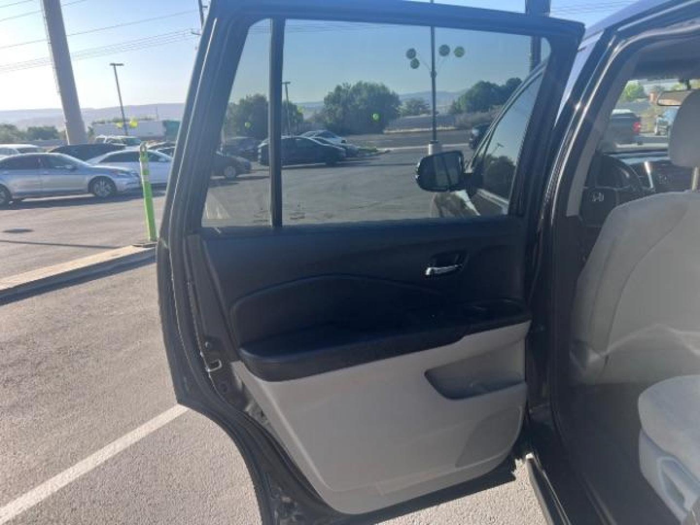 2018 Black Forest Pearl /Gray Honda Pilot LX (5FNYF5H13JB) with an 3.5L V-6 gasoline direct injection engine, AUTOMATIC transmission, located at 940 North Main Street, Cedar City, UT, 84720, (435) 628-0023, 37.692936, -113.061897 - We specialize in helping ALL people get the best financing available. No matter your credit score, good, bad or none we can get you an amazing rate. Had a bankruptcy, divorce, or repossessions? We give you the green light to get your credit back on the road. Low down and affordable payments that fit - Photo#19