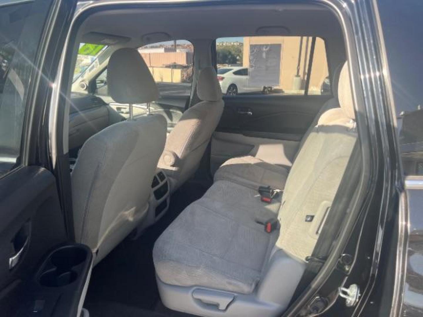 2018 Black Forest Pearl /Gray Honda Pilot LX (5FNYF5H13JB) with an 3.5L V-6 gasoline direct injection engine, AUTOMATIC transmission, located at 940 North Main Street, Cedar City, UT, 84720, (435) 628-0023, 37.692936, -113.061897 - We specialize in helping ALL people get the best financing available. No matter your credit score, good, bad or none we can get you an amazing rate. Had a bankruptcy, divorce, or repossessions? We give you the green light to get your credit back on the road. Low down and affordable payments that fit - Photo#20