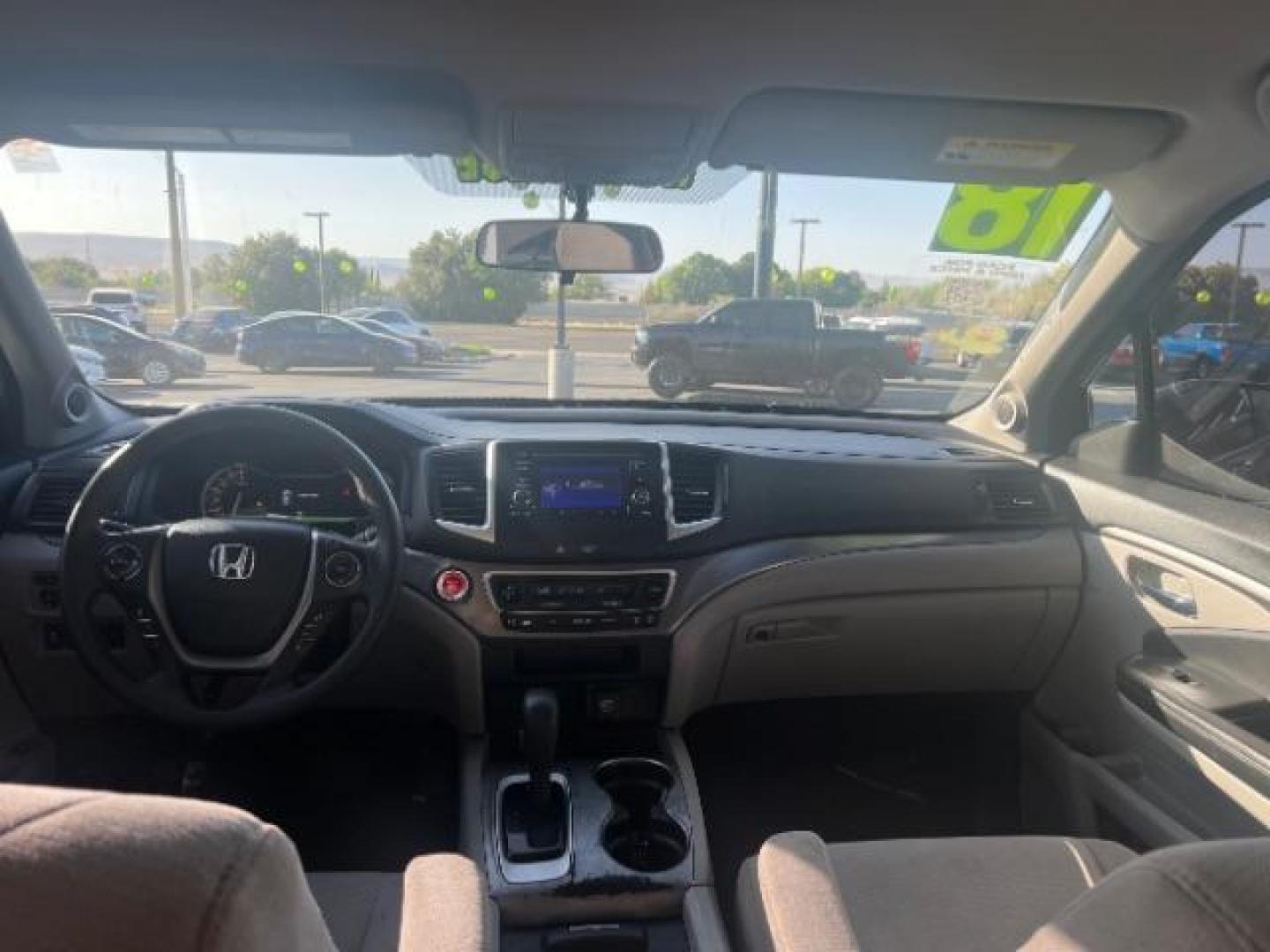 2018 Black Forest Pearl /Gray Honda Pilot LX (5FNYF5H13JB) with an 3.5L V-6 gasoline direct injection engine, AUTOMATIC transmission, located at 940 North Main Street, Cedar City, UT, 84720, (435) 628-0023, 37.692936, -113.061897 - We specialize in helping ALL people get the best financing available. No matter your credit score, good, bad or none we can get you an amazing rate. Had a bankruptcy, divorce, or repossessions? We give you the green light to get your credit back on the road. Low down and affordable payments that fit - Photo#22