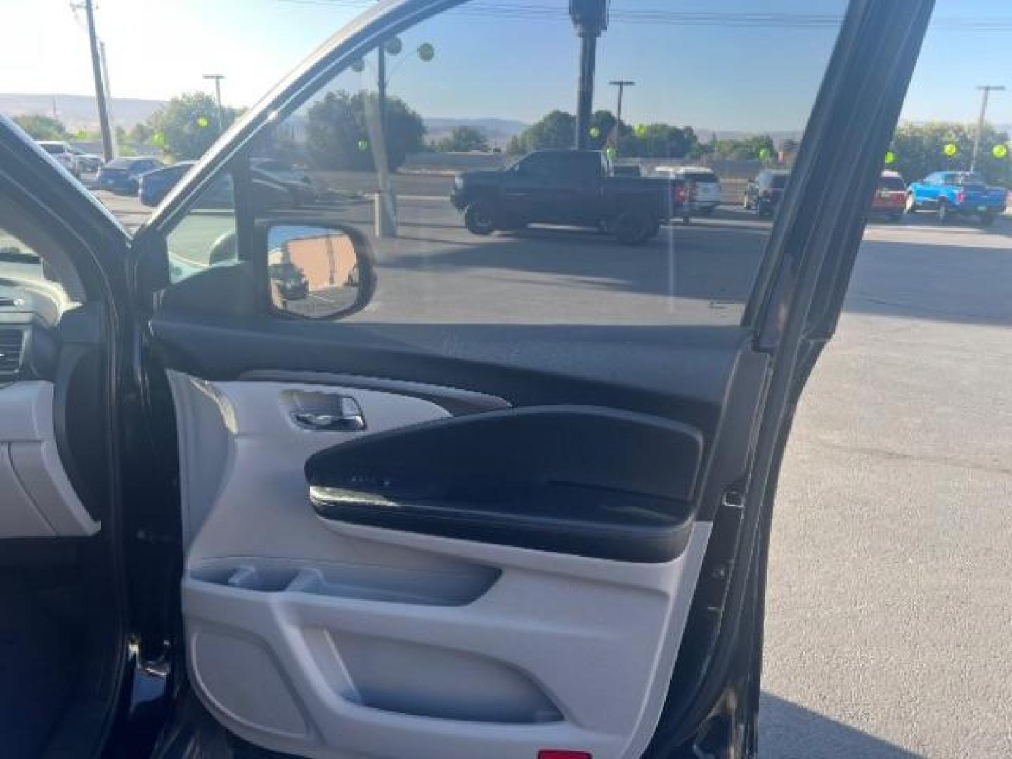 2018 Black Forest Pearl /Gray Honda Pilot LX (5FNYF5H13JB) with an 3.5L V-6 gasoline direct injection engine, AUTOMATIC transmission, located at 940 North Main Street, Cedar City, UT, 84720, (435) 628-0023, 37.692936, -113.061897 - We specialize in helping ALL people get the best financing available. No matter your credit score, good, bad or none we can get you an amazing rate. Had a bankruptcy, divorce, or repossessions? We give you the green light to get your credit back on the road. Low down and affordable payments that fit - Photo#29
