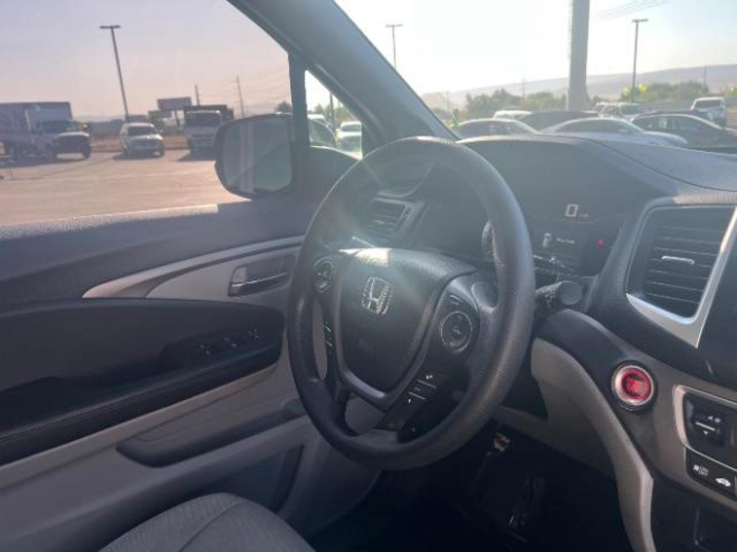 2018 Black Forest Pearl /Gray Honda Pilot LX (5FNYF5H13JB) with an 3.5L V-6 gasoline direct injection engine, AUTOMATIC transmission, located at 940 North Main Street, Cedar City, UT, 84720, (435) 628-0023, 37.692936, -113.061897 - We specialize in helping ALL people get the best financing available. No matter your credit score, good, bad or none we can get you an amazing rate. Had a bankruptcy, divorce, or repossessions? We give you the green light to get your credit back on the road. Low down and affordable payments that fit - Photo#32