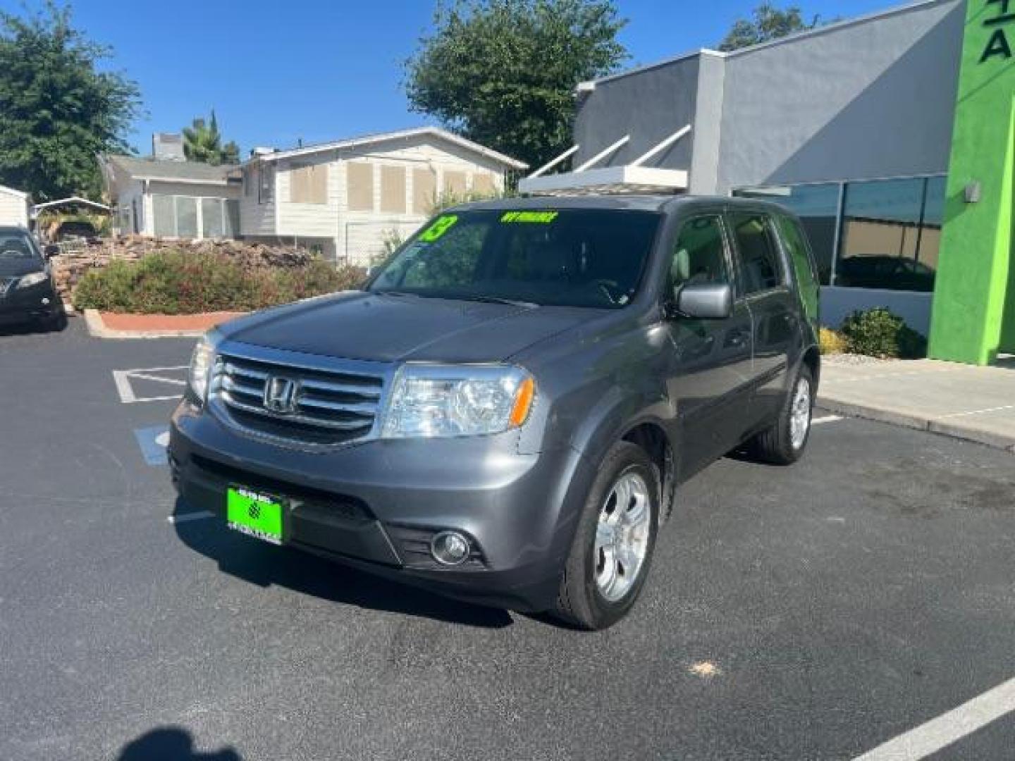 2013 Polished Metal Metallic /Beige Honda Pilot EX-L (5FNYF3H55DB) with an 3.5L V-6 i-VTEC VCM variable valve control engine, Automatic transmission, located at 1865 East Red Hills Pkwy, St. George, 84770, (435) 628-0023, 37.120850, -113.543640 - We specialize in helping ALL people get the best financing available. No matter your credit score, good, bad or none we can get you an amazing rate. Had a bankruptcy, divorce, or repossessions? We give you the green light to get your credit back on the road. Low down and affordable payments that fit - Photo#2