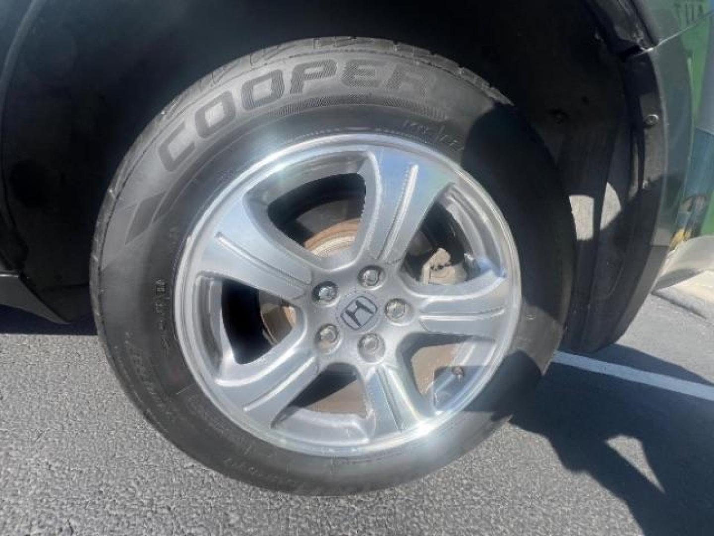 2013 Polished Metal Metallic /Beige Honda Pilot EX-L (5FNYF3H55DB) with an 3.5L V-6 i-VTEC VCM variable valve control engine, Automatic transmission, located at 1865 East Red Hills Pkwy, St. George, 84770, (435) 628-0023, 37.120850, -113.543640 - We specialize in helping ALL people get the best financing available. No matter your credit score, good, bad or none we can get you an amazing rate. Had a bankruptcy, divorce, or repossessions? We give you the green light to get your credit back on the road. Low down and affordable payments that fit - Photo#10