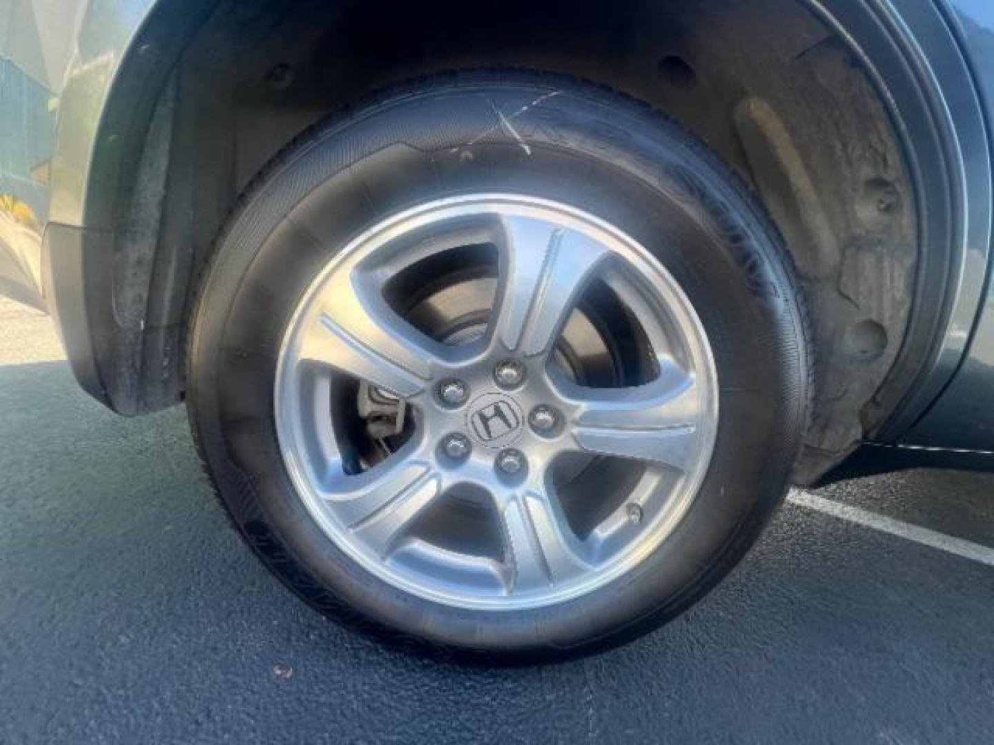 2013 Polished Metal Metallic /Beige Honda Pilot EX-L (5FNYF3H55DB) with an 3.5L V-6 i-VTEC VCM variable valve control engine, Automatic transmission, located at 1865 East Red Hills Pkwy, St. George, 84770, (435) 628-0023, 37.120850, -113.543640 - We specialize in helping ALL people get the best financing available. No matter your credit score, good, bad or none we can get you an amazing rate. Had a bankruptcy, divorce, or repossessions? We give you the green light to get your credit back on the road. Low down and affordable payments that fit - Photo#11