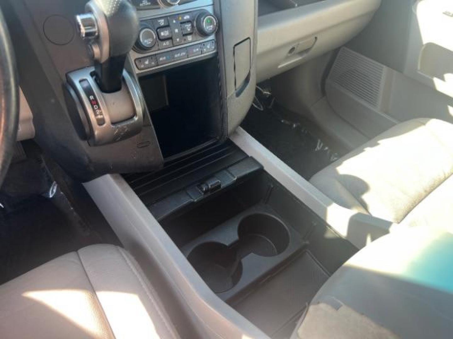 2013 Polished Metal Metallic /Beige Honda Pilot EX-L (5FNYF3H55DB) with an 3.5L V-6 i-VTEC VCM variable valve control engine, Automatic transmission, located at 1865 East Red Hills Pkwy, St. George, 84770, (435) 628-0023, 37.120850, -113.543640 - We specialize in helping ALL people get the best financing available. No matter your credit score, good, bad or none we can get you an amazing rate. Had a bankruptcy, divorce, or repossessions? We give you the green light to get your credit back on the road. Low down and affordable payments that fit - Photo#19