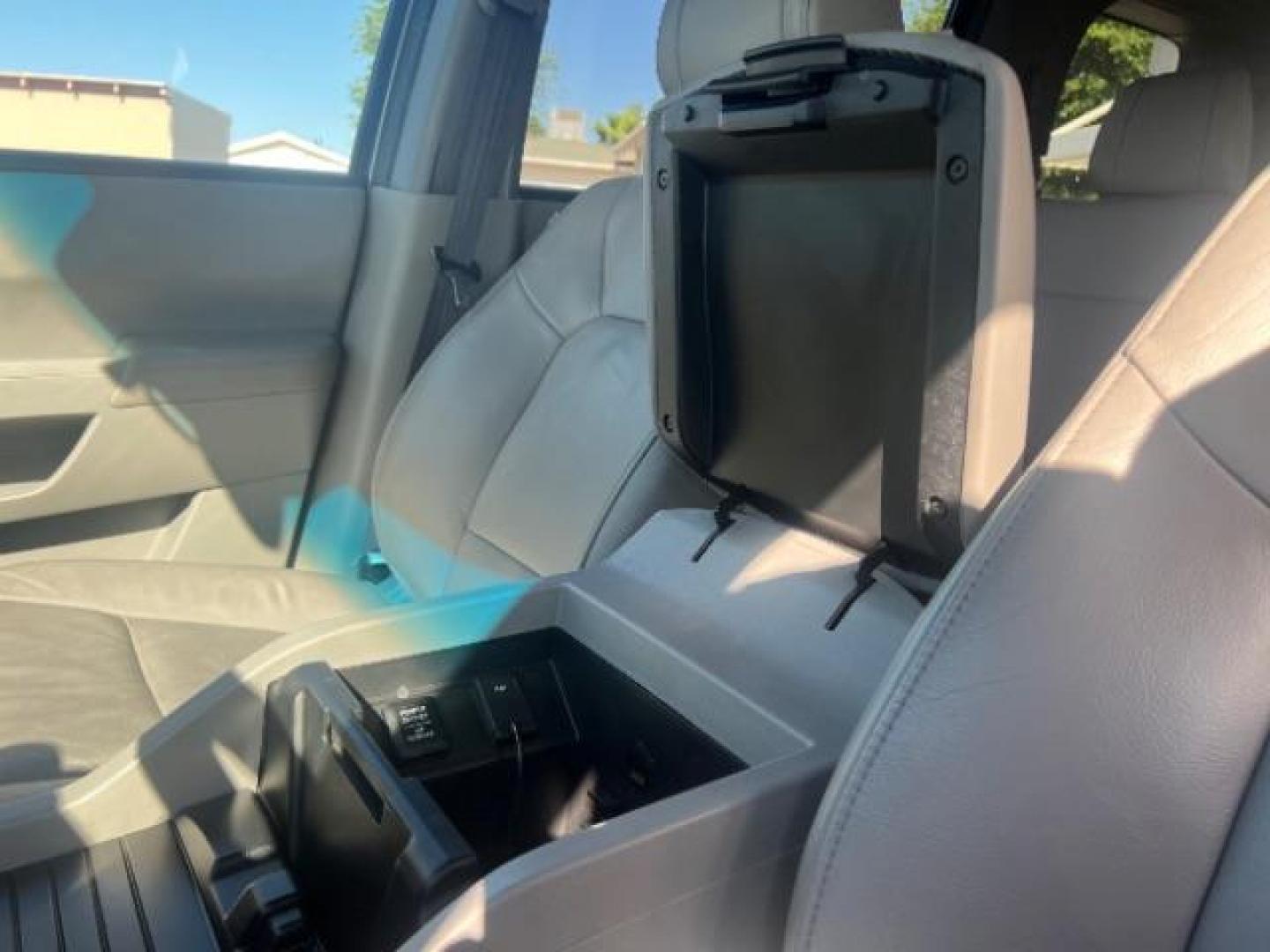 2013 Polished Metal Metallic /Beige Honda Pilot EX-L (5FNYF3H55DB) with an 3.5L V-6 i-VTEC VCM variable valve control engine, Automatic transmission, located at 1865 East Red Hills Pkwy, St. George, 84770, (435) 628-0023, 37.120850, -113.543640 - We specialize in helping ALL people get the best financing available. No matter your credit score, good, bad or none we can get you an amazing rate. Had a bankruptcy, divorce, or repossessions? We give you the green light to get your credit back on the road. Low down and affordable payments that fit - Photo#20