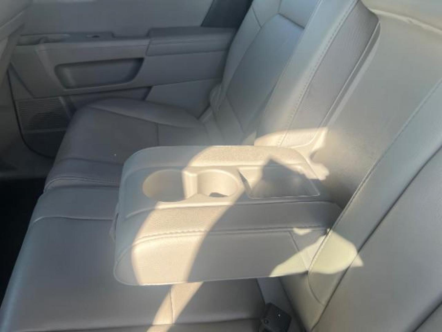 2013 Polished Metal Metallic /Beige Honda Pilot EX-L (5FNYF3H55DB) with an 3.5L V-6 i-VTEC VCM variable valve control engine, Automatic transmission, located at 1865 East Red Hills Pkwy, St. George, 84770, (435) 628-0023, 37.120850, -113.543640 - We specialize in helping ALL people get the best financing available. No matter your credit score, good, bad or none we can get you an amazing rate. Had a bankruptcy, divorce, or repossessions? We give you the green light to get your credit back on the road. Low down and affordable payments that fit - Photo#23