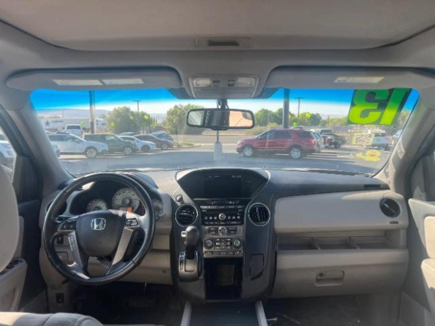 2013 Polished Metal Metallic /Beige Honda Pilot EX-L (5FNYF3H55DB) with an 3.5L V-6 i-VTEC VCM variable valve control engine, Automatic transmission, located at 1865 East Red Hills Pkwy, St. George, 84770, (435) 628-0023, 37.120850, -113.543640 - We specialize in helping ALL people get the best financing available. No matter your credit score, good, bad or none we can get you an amazing rate. Had a bankruptcy, divorce, or repossessions? We give you the green light to get your credit back on the road. Low down and affordable payments that fit - Photo#25
