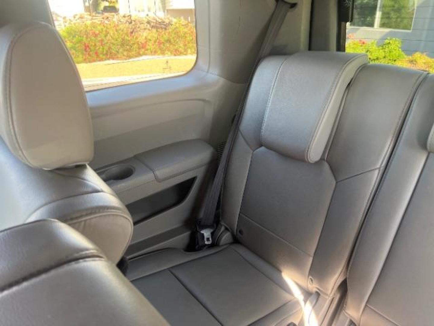 2013 Polished Metal Metallic /Beige Honda Pilot EX-L (5FNYF3H55DB) with an 3.5L V-6 i-VTEC VCM variable valve control engine, Automatic transmission, located at 1865 East Red Hills Pkwy, St. George, 84770, (435) 628-0023, 37.120850, -113.543640 - We specialize in helping ALL people get the best financing available. No matter your credit score, good, bad or none we can get you an amazing rate. Had a bankruptcy, divorce, or repossessions? We give you the green light to get your credit back on the road. Low down and affordable payments that fit - Photo#26