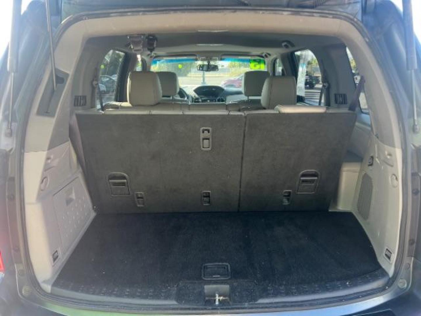 2013 Polished Metal Metallic /Beige Honda Pilot EX-L (5FNYF3H55DB) with an 3.5L V-6 i-VTEC VCM variable valve control engine, Automatic transmission, located at 1865 East Red Hills Pkwy, St. George, 84770, (435) 628-0023, 37.120850, -113.543640 - We specialize in helping ALL people get the best financing available. No matter your credit score, good, bad or none we can get you an amazing rate. Had a bankruptcy, divorce, or repossessions? We give you the green light to get your credit back on the road. Low down and affordable payments that fit - Photo#29