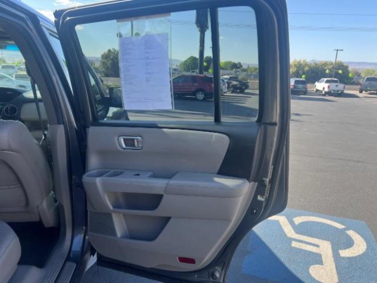 2013 Polished Metal Metallic /Beige Honda Pilot EX-L (5FNYF3H55DB) with an 3.5L V-6 i-VTEC VCM variable valve control engine, Automatic transmission, located at 1865 East Red Hills Pkwy, St. George, 84770, (435) 628-0023, 37.120850, -113.543640 - We specialize in helping ALL people get the best financing available. No matter your credit score, good, bad or none we can get you an amazing rate. Had a bankruptcy, divorce, or repossessions? We give you the green light to get your credit back on the road. Low down and affordable payments that fit - Photo#30