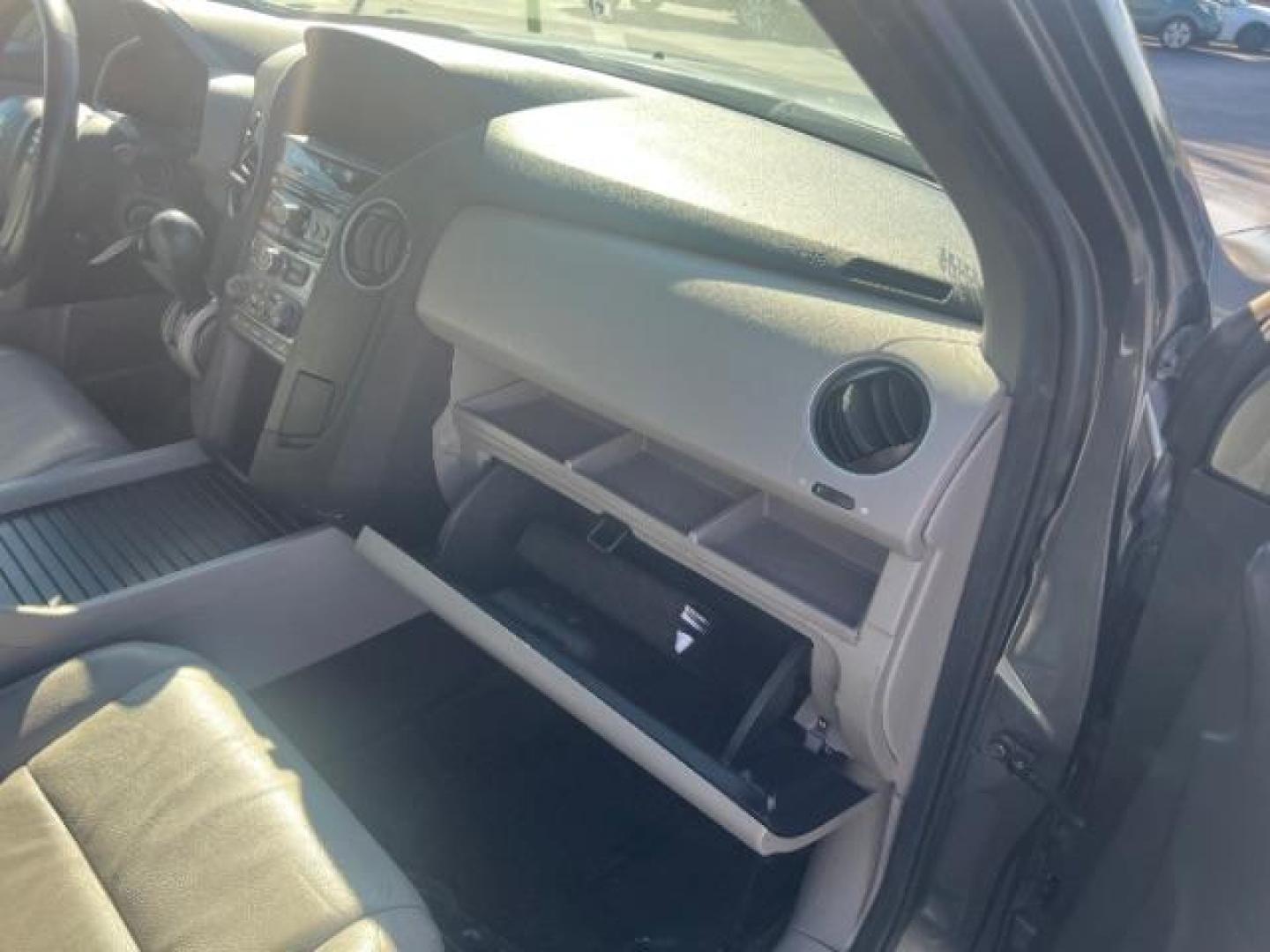 2013 Polished Metal Metallic /Beige Honda Pilot EX-L (5FNYF3H55DB) with an 3.5L V-6 i-VTEC VCM variable valve control engine, Automatic transmission, located at 1865 East Red Hills Pkwy, St. George, 84770, (435) 628-0023, 37.120850, -113.543640 - We specialize in helping ALL people get the best financing available. No matter your credit score, good, bad or none we can get you an amazing rate. Had a bankruptcy, divorce, or repossessions? We give you the green light to get your credit back on the road. Low down and affordable payments that fit - Photo#34