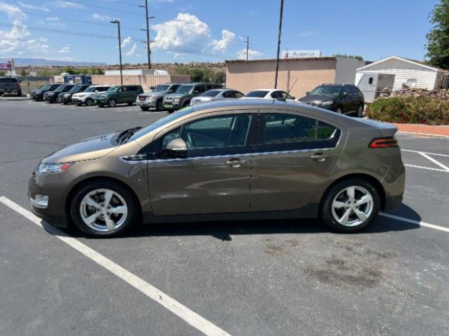 2014 BROWN /Charcoal, cloth Chevrolet Volt Standard (1G1RA6E42EU) with an 4 CYL Hybrid engine, AUTOMATIC transmission, located at 1865 East Red Hills Pkwy, St. George, 84770, (435) 628-0023, 37.120850, -113.543640 - ***This vehicle qualifies for the EV/Hybrid tax rebate of up to $4,000*** We are setup with the IRS to recieve direct payments within 72 hours. We file the rebate online with IRS and can credit it to your down payment, reduce the sales price OR give you cashback!! These cars will not last and can o - Photo#3