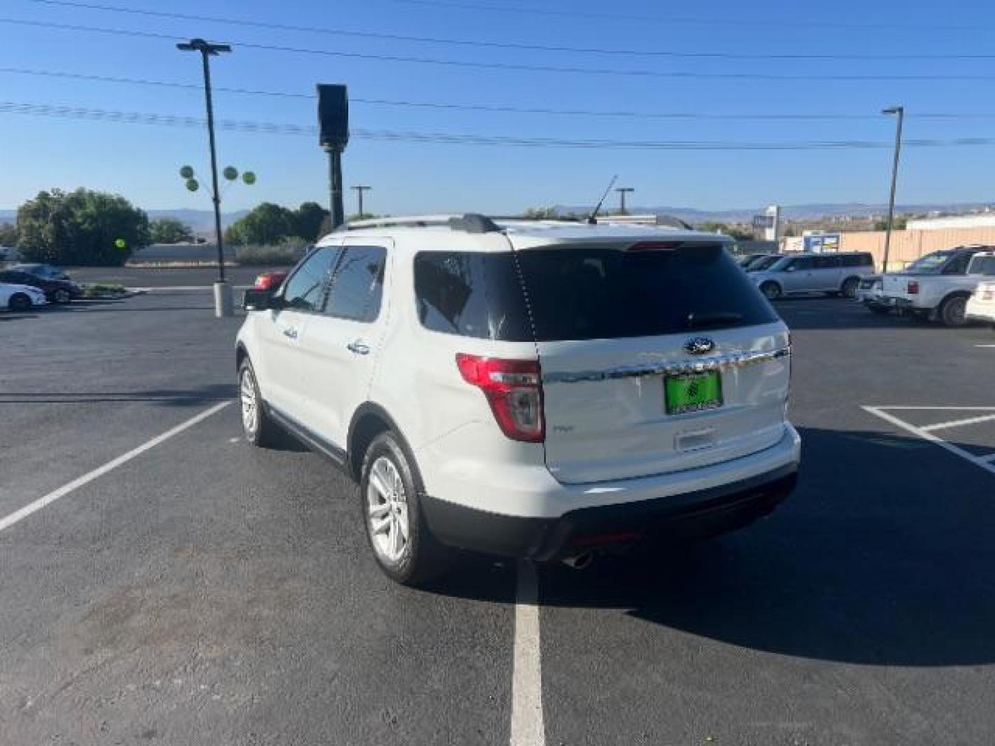 2015 Oxford White /Medium Light Stone Ford Explorer XLT (1FM5K7D85FG) with an EcoBoost 2L I-4 gasoline direct injection engine, Automatic transmission, located at 940 North Main Street, Cedar City, UT, 84720, (435) 628-0023, 37.692936, -113.061897 - We specialize in helping ALL people get the best financing available. No matter your credit score, good, bad or none we can get you an amazing rate. Had a bankruptcy, divorce, or repossessions? We give you the green light to get your credit back on the road. Low down and affordable payments that fit - Photo#4