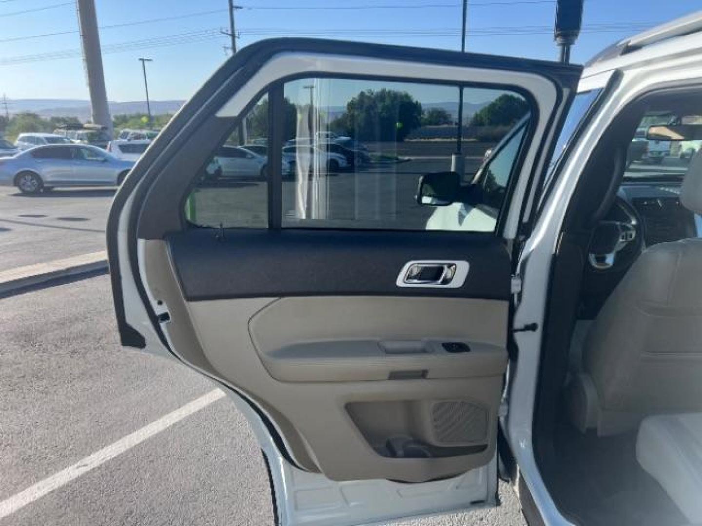 2015 Oxford White /Medium Light Stone Ford Explorer XLT (1FM5K7D85FG) with an EcoBoost 2L I-4 gasoline direct injection engine, Automatic transmission, located at 940 North Main Street, Cedar City, UT, 84720, (435) 628-0023, 37.692936, -113.061897 - We specialize in helping ALL people get the best financing available. No matter your credit score, good, bad or none we can get you an amazing rate. Had a bankruptcy, divorce, or repossessions? We give you the green light to get your credit back on the road. Low down and affordable payments that fit - Photo#21