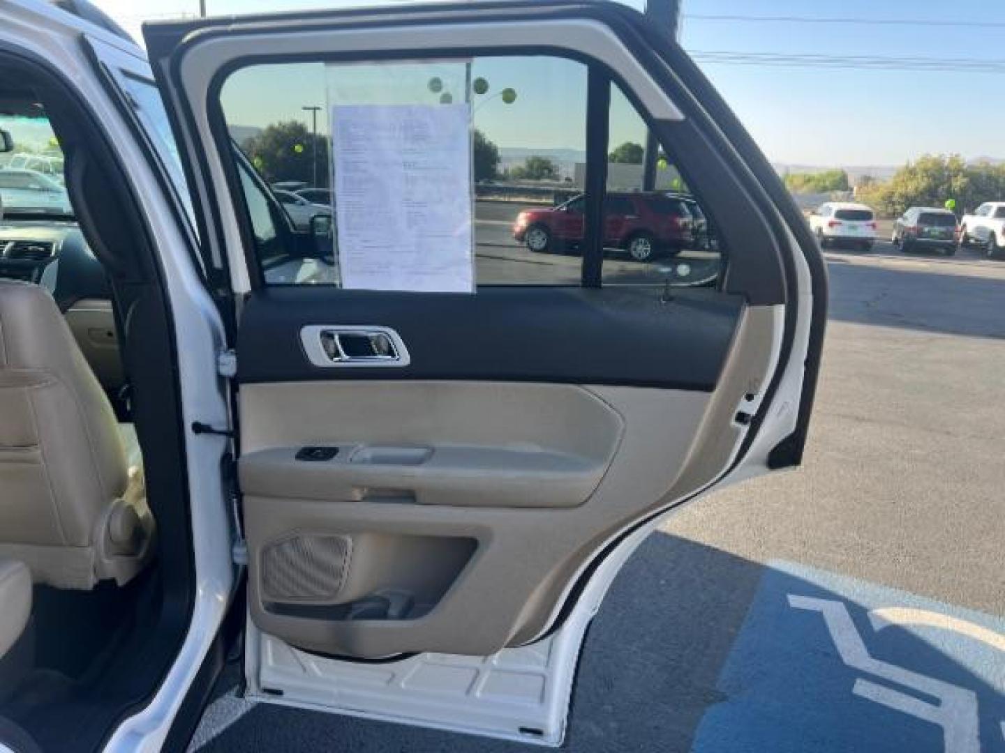 2015 Oxford White /Medium Light Stone Ford Explorer XLT (1FM5K7D85FG) with an EcoBoost 2L I-4 gasoline direct injection engine, Automatic transmission, located at 940 North Main Street, Cedar City, UT, 84720, (435) 628-0023, 37.692936, -113.061897 - We specialize in helping ALL people get the best financing available. No matter your credit score, good, bad or none we can get you an amazing rate. Had a bankruptcy, divorce, or repossessions? We give you the green light to get your credit back on the road. Low down and affordable payments that fit - Photo#29