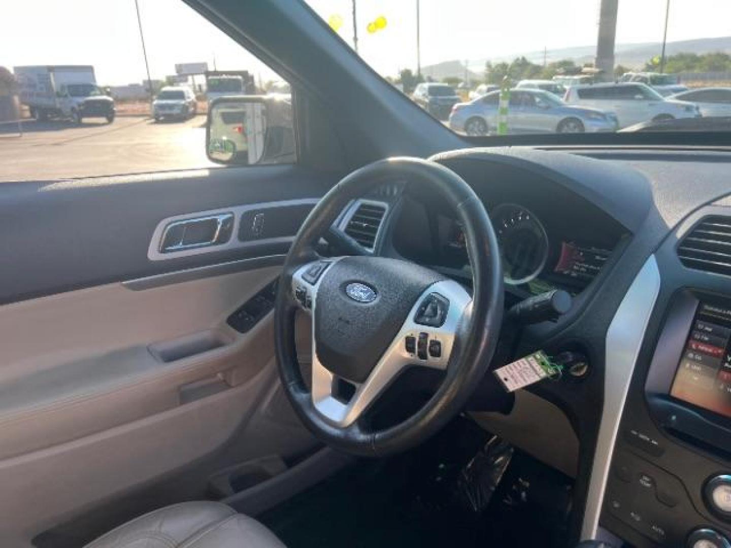 2015 Oxford White /Medium Light Stone Ford Explorer XLT (1FM5K7D85FG) with an EcoBoost 2L I-4 gasoline direct injection engine, Automatic transmission, located at 940 North Main Street, Cedar City, UT, 84720, (435) 628-0023, 37.692936, -113.061897 - We specialize in helping ALL people get the best financing available. No matter your credit score, good, bad or none we can get you an amazing rate. Had a bankruptcy, divorce, or repossessions? We give you the green light to get your credit back on the road. Low down and affordable payments that fit - Photo#34