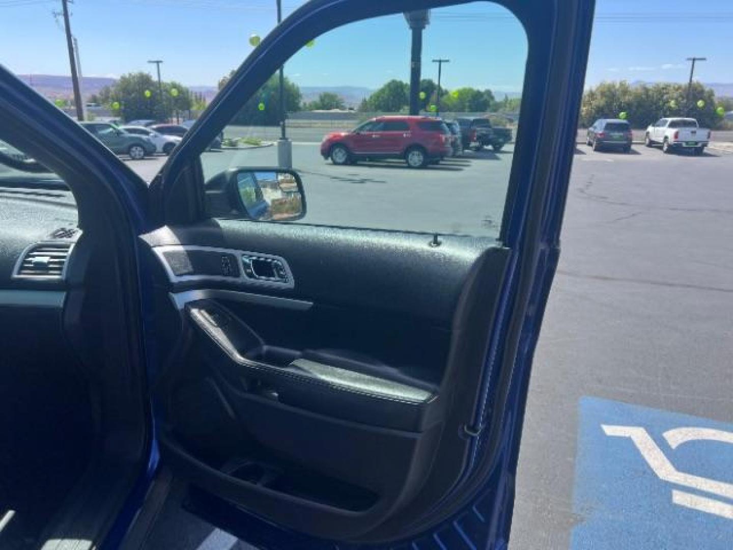 2015 Deep Impact Blue Metallic /Charcoal Black Ford Explorer XLT (1FM5K7D85FG) with an EcoBoost 2L I-4 gasoline direct injection engine, Automatic transmission, located at 940 North Main Street, Cedar City, UT, 84720, (435) 628-0023, 37.692936, -113.061897 - We specialize in helping ALL people get the best financing available. No matter your credit score, good, bad or none we can get you an amazing rate. Had a bankruptcy, divorce, or repossessions? We give you the green light to get your credit back on the road. Low down and affordable payments that fit - Photo#31