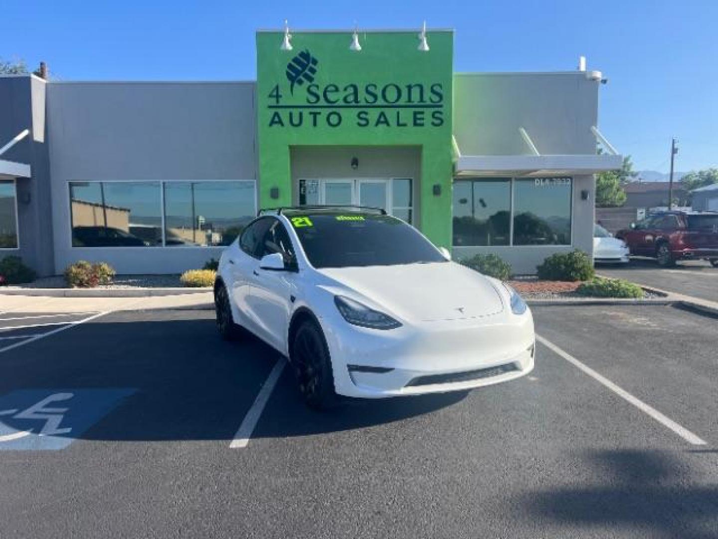 2021 Pearl White Multi-Coat /Black Tesla Model Y Long Range Dual Motor All-Wheel Drive (5YJYGDEE1MF) with an ELECTRIC engine, Continuously Variable Transmission transmission, located at 1865 East Red Hills Pkwy, St. George, 84770, (435) 628-0023, 37.120850, -113.543640 - ****Price includes $4k IRS EV REBATE**** We are approved to file the EV rebate directly with the IRS. We recived the funds in 7 days and take credit off the price of car. Check with IRS EV website to be sure you qualify. ~Congress has threatened to end rebate with the Big Beautiful Bill so ACT FAST - Photo#0