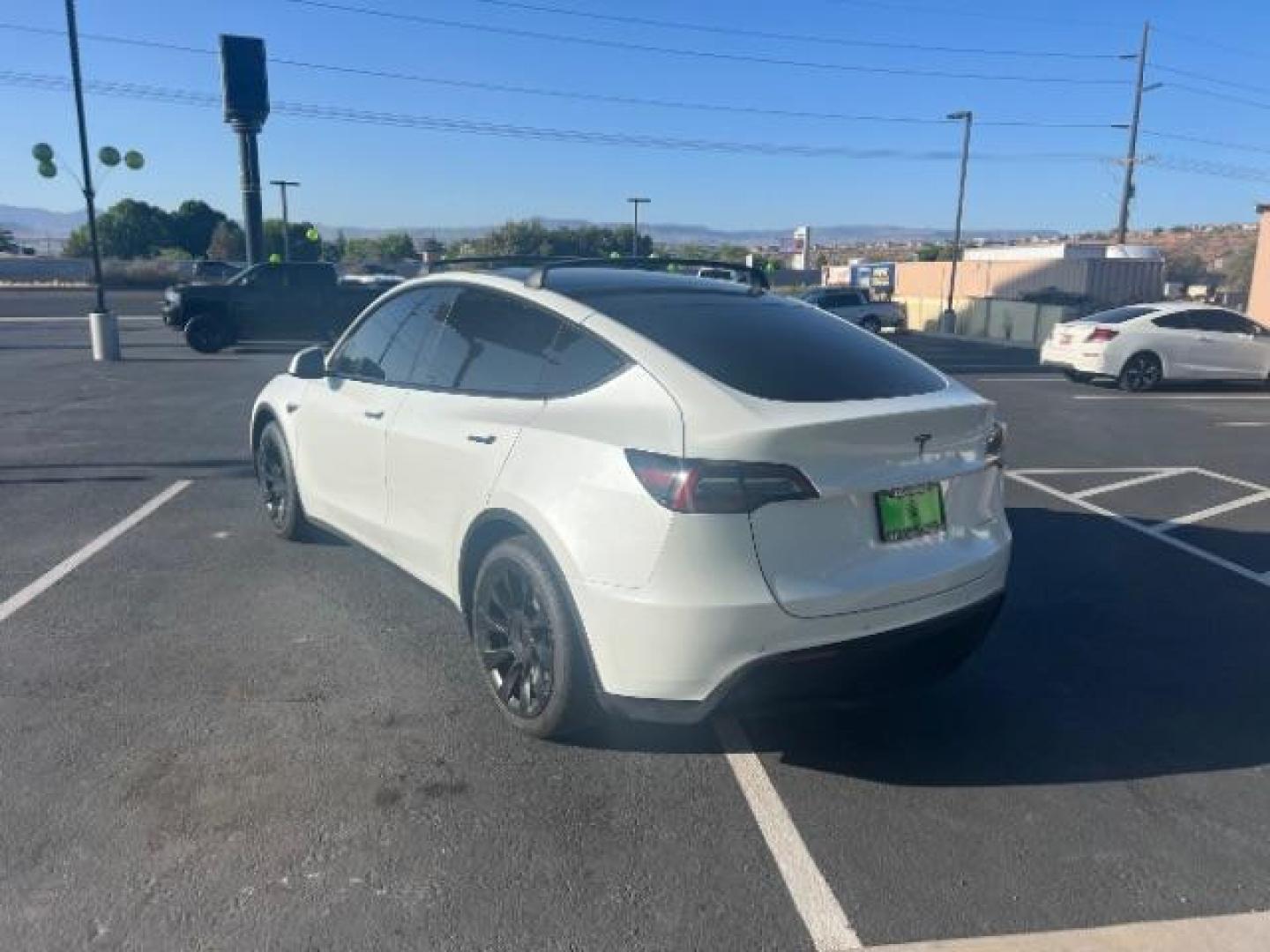 2021 Pearl White Multi-Coat /Black Tesla Model Y Long Range Dual Motor All-Wheel Drive (5YJYGDEE1MF) with an ELECTRIC engine, Continuously Variable Transmission transmission, located at 1865 East Red Hills Pkwy, St. George, 84770, (435) 628-0023, 37.120850, -113.543640 - ****Price includes $4k IRS EV REBATE**** We are approved to file the EV rebate directly with the IRS. We recived the funds in 7 days and take credit off the price of car. Check with IRS EV website to be sure you qualify. ~Congress has threatened to end rebate with the Big Beautiful Bill so ACT FAST - Photo#6