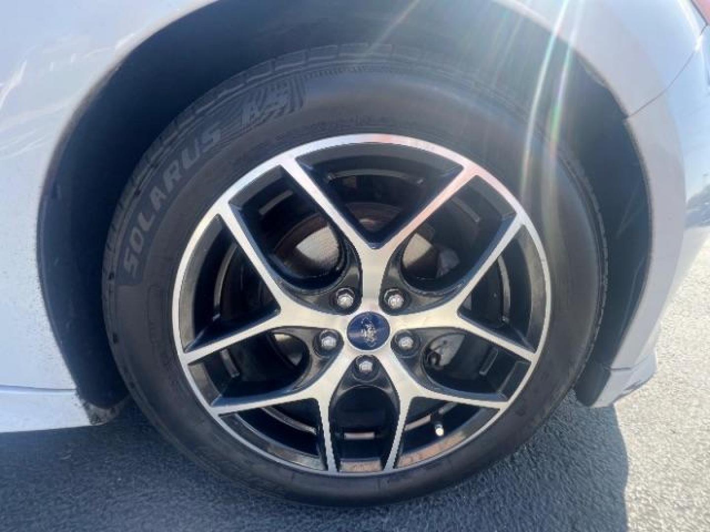 2016 Oxford White /Charcoal Black Ford Focus SE (1FADP3K29GL) with an 2L I-4 gasoline direct injection engine, Automatic transmission, located at 940 North Main Street, Cedar City, UT, 84720, (435) 628-0023, 37.692936, -113.061897 - Photo#9