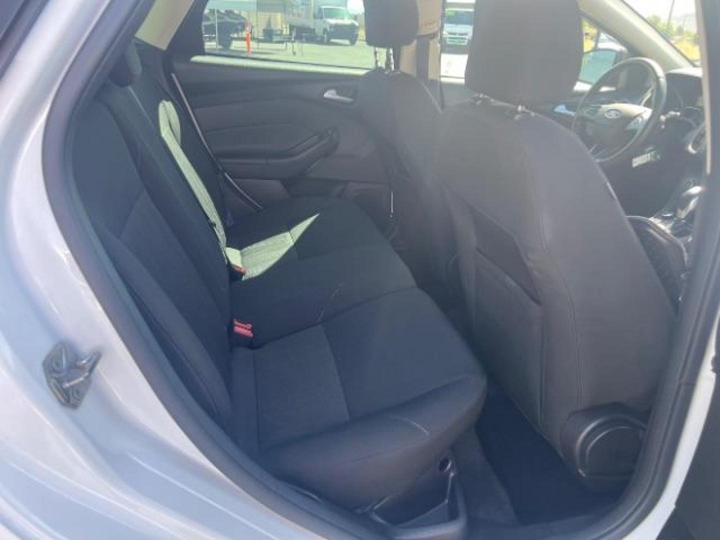 2016 Oxford White /Charcoal Black Ford Focus SE (1FADP3K29GL) with an 2L I-4 gasoline direct injection engine, Automatic transmission, located at 940 North Main Street, Cedar City, UT, 84720, (435) 628-0023, 37.692936, -113.061897 - Photo#26