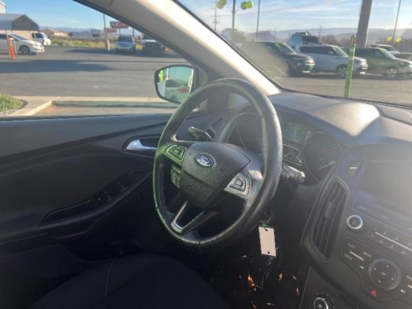 2016 Oxford White /Charcoal Black Ford Focus SE (1FADP3K29GL) with an 2L I-4 gasoline direct injection engine, Automatic transmission, located at 1865 East Red Hills Pkwy, St. George, 84770, (435) 628-0023, 37.120850, -113.543640 - We specialize in helping ALL people get the best financing available. No matter your credit score, good, bad or none we can get you an amazing rate. Had a bankruptcy, divorce, or repossessions? We give you the green light to get your credit back on the road. Low down and affordable payments that fit - Photo#29