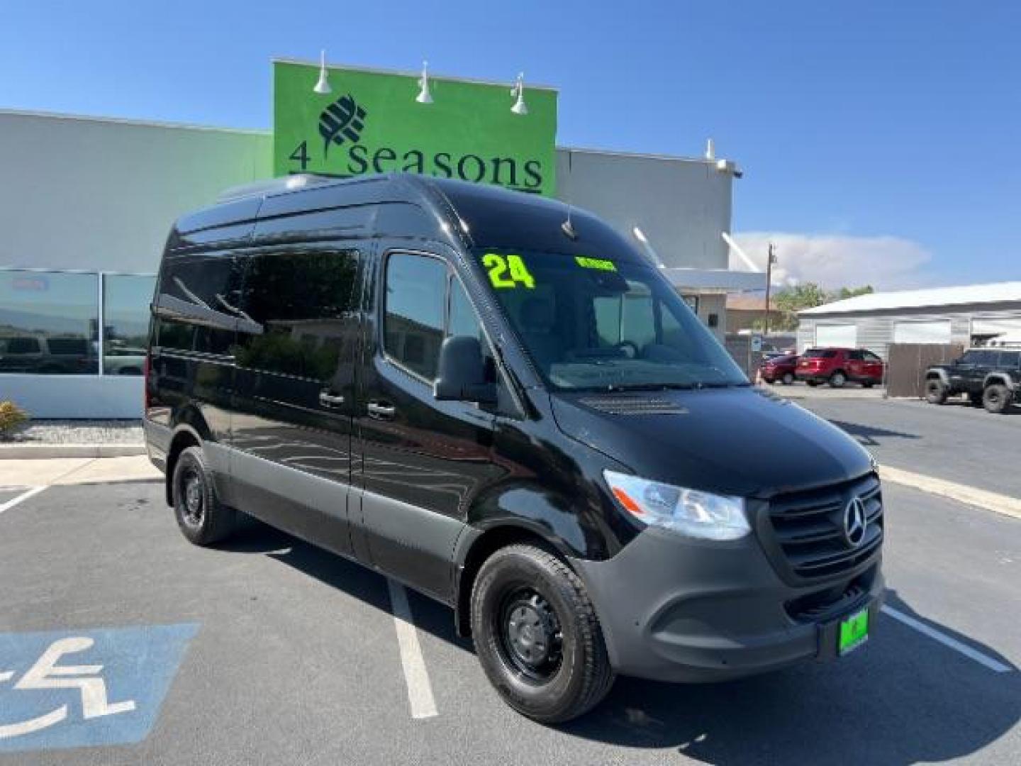 2024 Jet Black /Black Mercedes-Benz Sprinter 2500 Standard Roof 4-Cyl Diesel HO (W1Z4NFHYXRP) with an 2L I-4 diesel direct injection engine, Automatic transmission, located at 1865 East Red Hills Pkwy, St. George, 84770, (435) 628-0023, 37.120850, -113.543640 - Near new 12 passenger Sprinter. Low miles with full factory warranty. 1 owner and NO accidents. 3rd Row Seat Automatic Parking Back-Up Camera Blind Spot Monitor Bluetooth Connection Heated Front Seat(s) Privacy Glass Rain Sensing Wipers Rear A/C Rear Parking Aid Tire Pressure Monitor BLACK, LEATHER - Photo#0