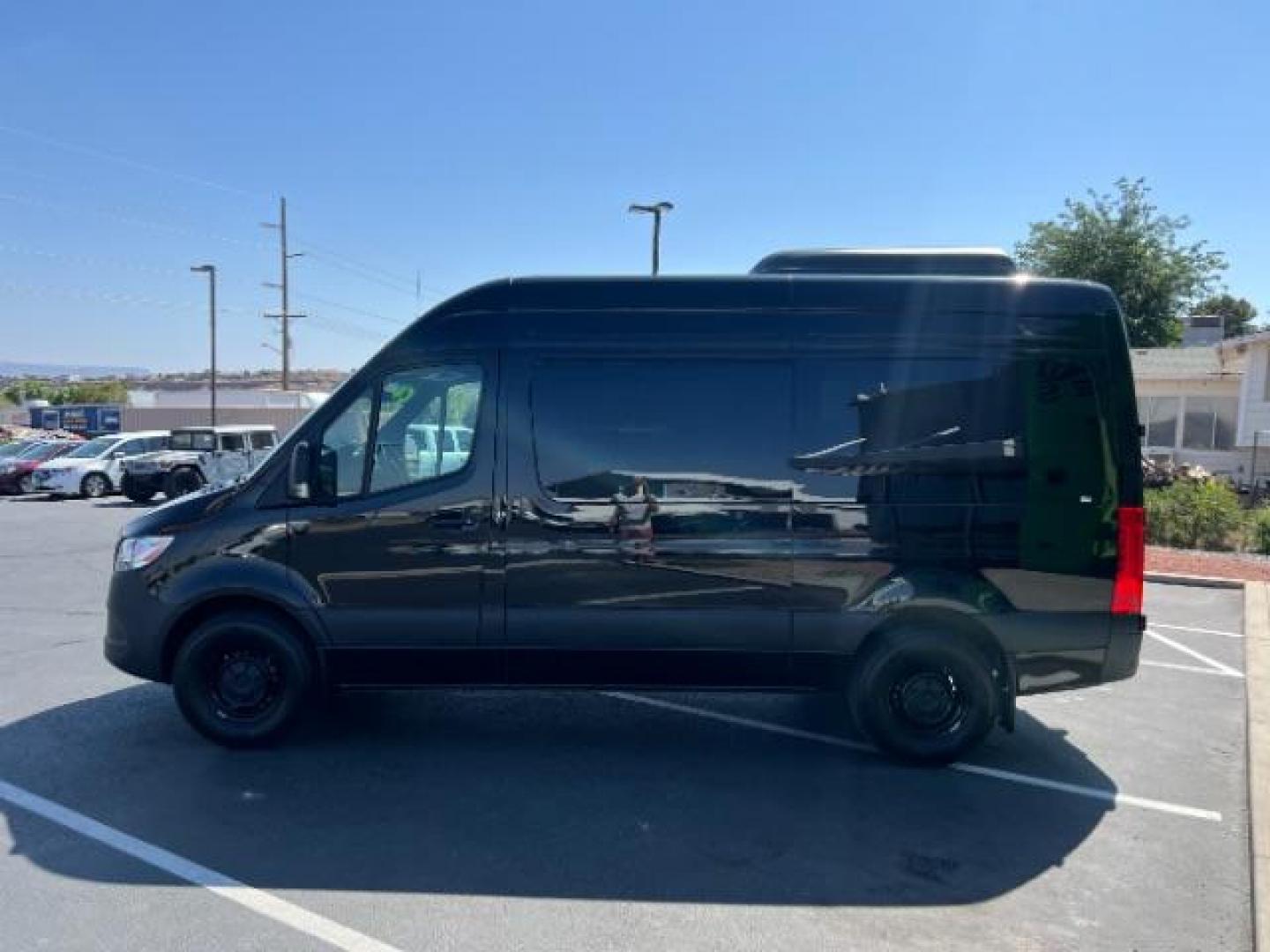 2024 Jet Black /Black Mercedes-Benz Sprinter 2500 Standard Roof 4-Cyl Diesel HO (W1Z4NFHYXRP) with an 2L I-4 diesel direct injection engine, Automatic transmission, located at 1865 East Red Hills Pkwy, St. George, 84770, (435) 628-0023, 37.120850, -113.543640 - Near new 12 passenger Sprinter. Low miles with full factory warranty. 1 owner and NO accidents. 3rd Row Seat Automatic Parking Back-Up Camera Blind Spot Monitor Bluetooth Connection Heated Front Seat(s) Privacy Glass Rain Sensing Wipers Rear A/C Rear Parking Aid Tire Pressure Monitor BLACK, LEATHER - Photo#3