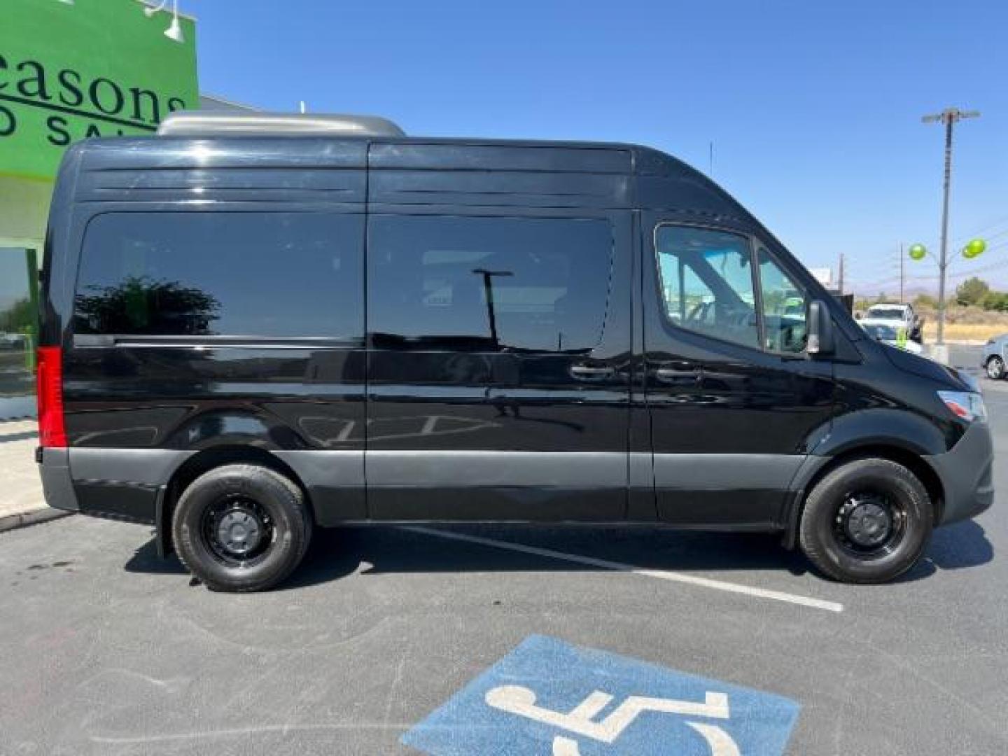 2024 Jet Black /Black Mercedes-Benz Sprinter 2500 Standard Roof 4-Cyl Diesel HO (W1Z4NFHYXRP) with an 2L I-4 diesel direct injection engine, Automatic transmission, located at 1865 East Red Hills Pkwy, St. George, 84770, (435) 628-0023, 37.120850, -113.543640 - Near new 12 passenger Sprinter. Low miles with full factory warranty. 1 owner and NO accidents. 3rd Row Seat Automatic Parking Back-Up Camera Blind Spot Monitor Bluetooth Connection Heated Front Seat(s) Privacy Glass Rain Sensing Wipers Rear A/C Rear Parking Aid Tire Pressure Monitor BLACK, LEATHER - Photo#5