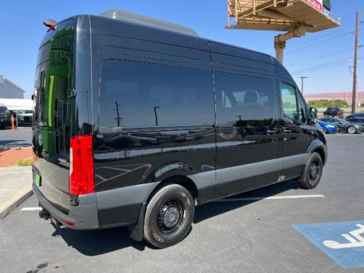 2024 Jet Black /Black Mercedes-Benz Sprinter 2500 Standard Roof 4-Cyl Diesel HO (W1Z4NFHYXRP) with an 2L I-4 diesel direct injection engine, Automatic transmission, located at 1865 East Red Hills Pkwy, St. George, 84770, (435) 628-0023, 37.120850, -113.543640 - Near new 12 passenger Sprinter. Low miles with full factory warranty. 1 owner and NO accidents. 3rd Row Seat Automatic Parking Back-Up Camera Blind Spot Monitor Bluetooth Connection Heated Front Seat(s) Privacy Glass Rain Sensing Wipers Rear A/C Rear Parking Aid Tire Pressure Monitor BLACK, LEATHER - Photo#6