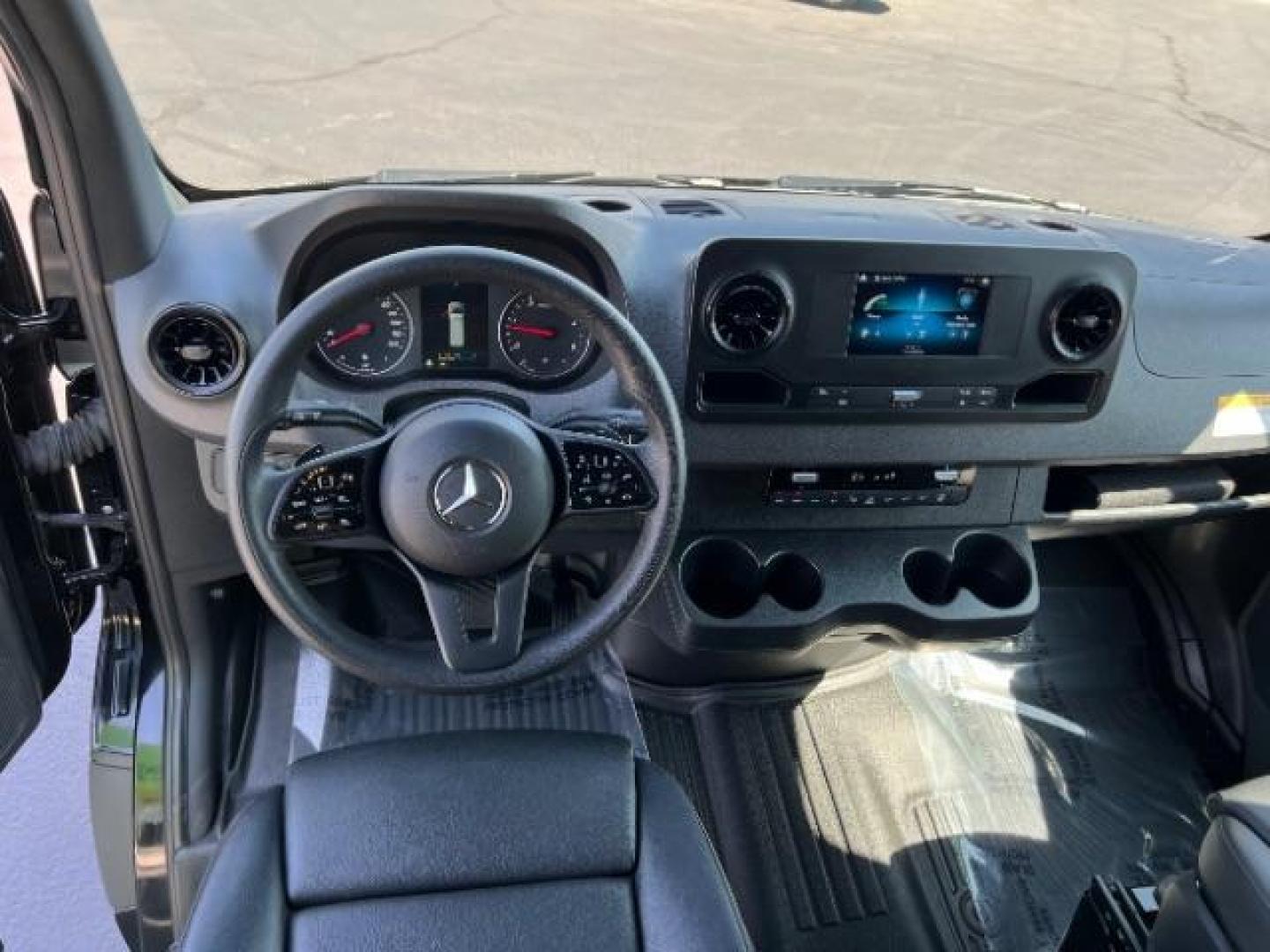 2024 Jet Black /Black Mercedes-Benz Sprinter 2500 Standard Roof 4-Cyl Diesel HO (W1Z4NFHYXRP) with an 2L I-4 diesel direct injection engine, Automatic transmission, located at 1865 East Red Hills Pkwy, St. George, 84770, (435) 628-0023, 37.120850, -113.543640 - Near new 12 passenger Sprinter. Low miles with full factory warranty. 1 owner and NO accidents. 3rd Row Seat Automatic Parking Back-Up Camera Blind Spot Monitor Bluetooth Connection Heated Front Seat(s) Privacy Glass Rain Sensing Wipers Rear A/C Rear Parking Aid Tire Pressure Monitor BLACK, LEATHER - Photo#11