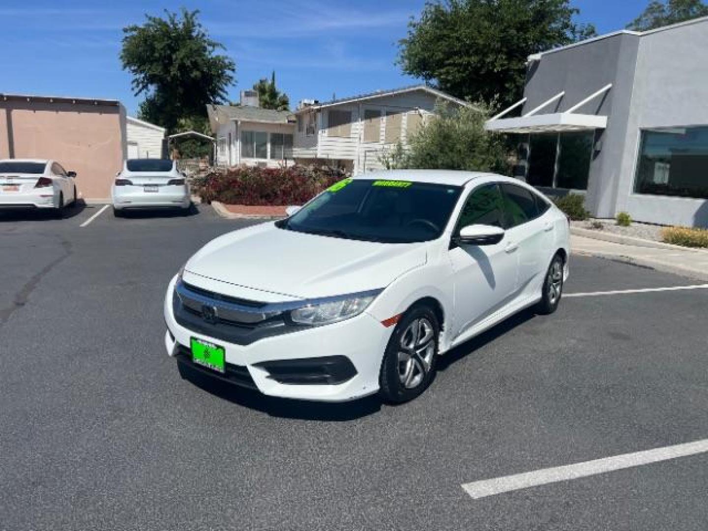 2016 Taffeta White /Ivory Honda Civic LX (2HGFC2F52GH) with an 2L I-4 DOHC engine, Automatic transmission, located at 1865 East Red Hills Pkwy, St. George, 84770, (435) 628-0023, 37.120850, -113.543640 - We specialize in helping ALL people get the best financing available. No matter your credit score, good, bad or none we can get you an amazing rate. Had a bankruptcy, divorce, or repossessions? We give you the green light to get your credit back on the road. Low down and affordable payments that fit- Photo#2