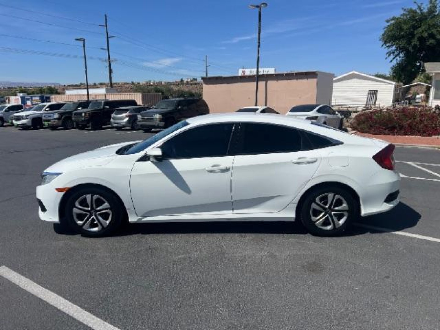 2016 Taffeta White /Ivory Honda Civic LX (2HGFC2F52GH) with an 2L I-4 DOHC engine, Automatic transmission, located at 1865 East Red Hills Pkwy, St. George, 84770, (435) 628-0023, 37.120850, -113.543640 - We specialize in helping ALL people get the best financing available. No matter your credit score, good, bad or none we can get you an amazing rate. Had a bankruptcy, divorce, or repossessions? We give you the green light to get your credit back on the road. Low down and affordable payments that fit- Photo#3