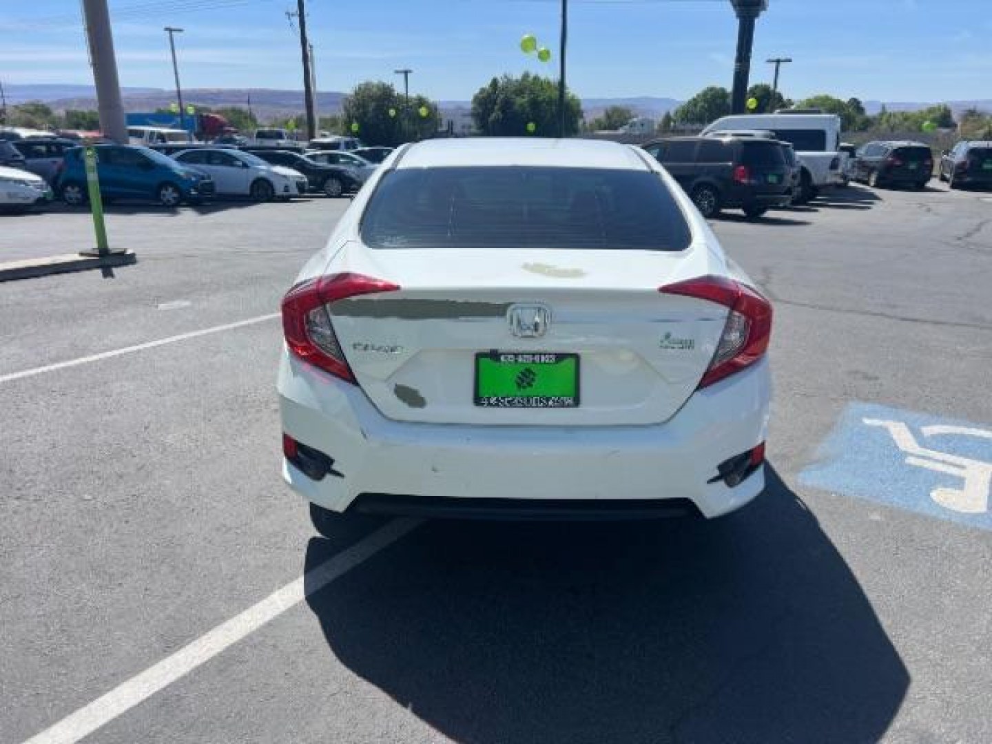 2016 Taffeta White /Ivory Honda Civic LX (2HGFC2F52GH) with an 2L I-4 DOHC engine, Automatic transmission, located at 1865 East Red Hills Pkwy, St. George, 84770, (435) 628-0023, 37.120850, -113.543640 - We specialize in helping ALL people get the best financing available. No matter your credit score, good, bad or none we can get you an amazing rate. Had a bankruptcy, divorce, or repossessions? We give you the green light to get your credit back on the road. Low down and affordable payments that fit- Photo#5