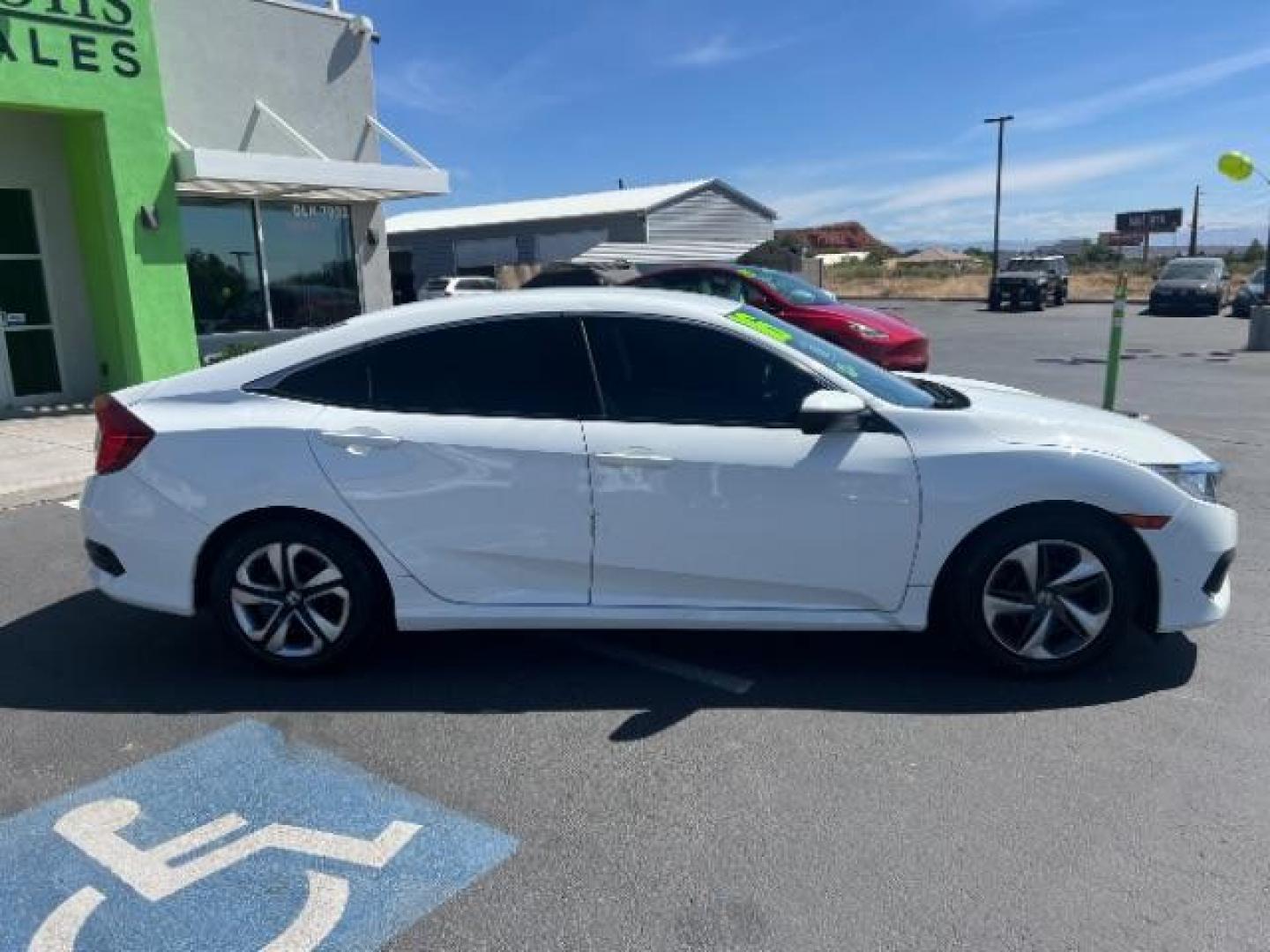 2016 Taffeta White /Ivory Honda Civic LX (2HGFC2F52GH) with an 2L I-4 DOHC engine, Automatic transmission, located at 1865 East Red Hills Pkwy, St. George, 84770, (435) 628-0023, 37.120850, -113.543640 - We specialize in helping ALL people get the best financing available. No matter your credit score, good, bad or none we can get you an amazing rate. Had a bankruptcy, divorce, or repossessions? We give you the green light to get your credit back on the road. Low down and affordable payments that fit- Photo#7