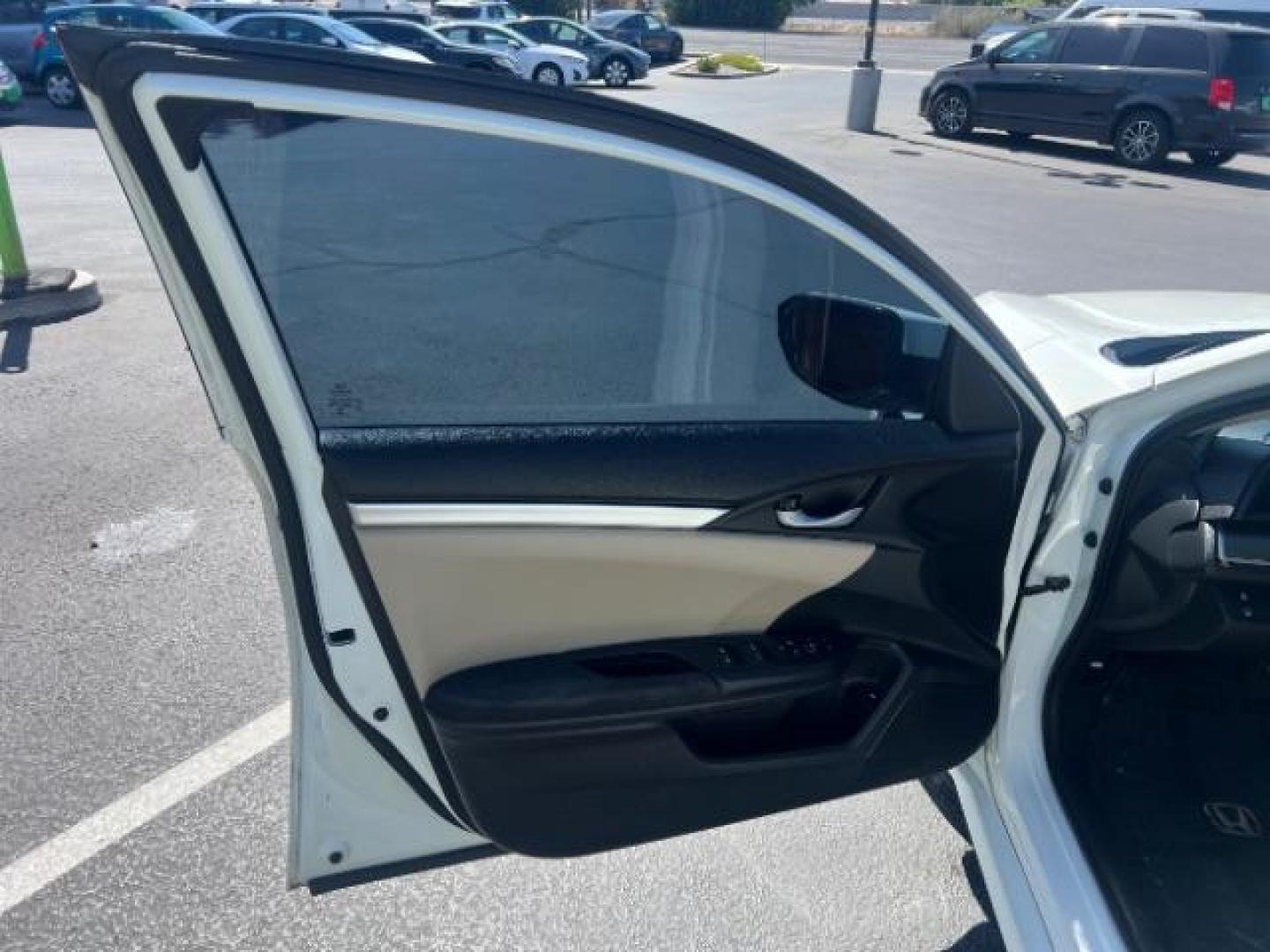 2016 Taffeta White /Ivory Honda Civic LX (2HGFC2F52GH) with an 2L I-4 DOHC engine, Automatic transmission, located at 1865 East Red Hills Pkwy, St. George, 84770, (435) 628-0023, 37.120850, -113.543640 - We specialize in helping ALL people get the best financing available. No matter your credit score, good, bad or none we can get you an amazing rate. Had a bankruptcy, divorce, or repossessions? We give you the green light to get your credit back on the road. Low down and affordable payments that fit- Photo#12