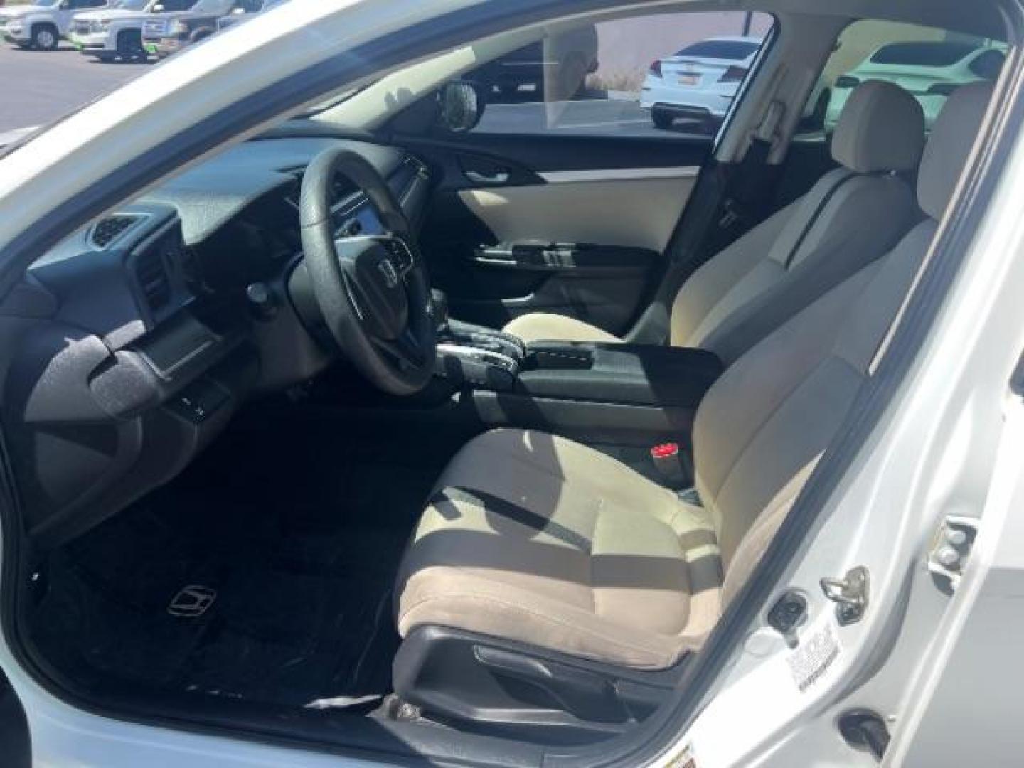 2016 Taffeta White /Ivory Honda Civic LX (2HGFC2F52GH) with an 2L I-4 DOHC engine, Automatic transmission, located at 1865 East Red Hills Pkwy, St. George, 84770, (435) 628-0023, 37.120850, -113.543640 - We specialize in helping ALL people get the best financing available. No matter your credit score, good, bad or none we can get you an amazing rate. Had a bankruptcy, divorce, or repossessions? We give you the green light to get your credit back on the road. Low down and affordable payments that fit- Photo#14