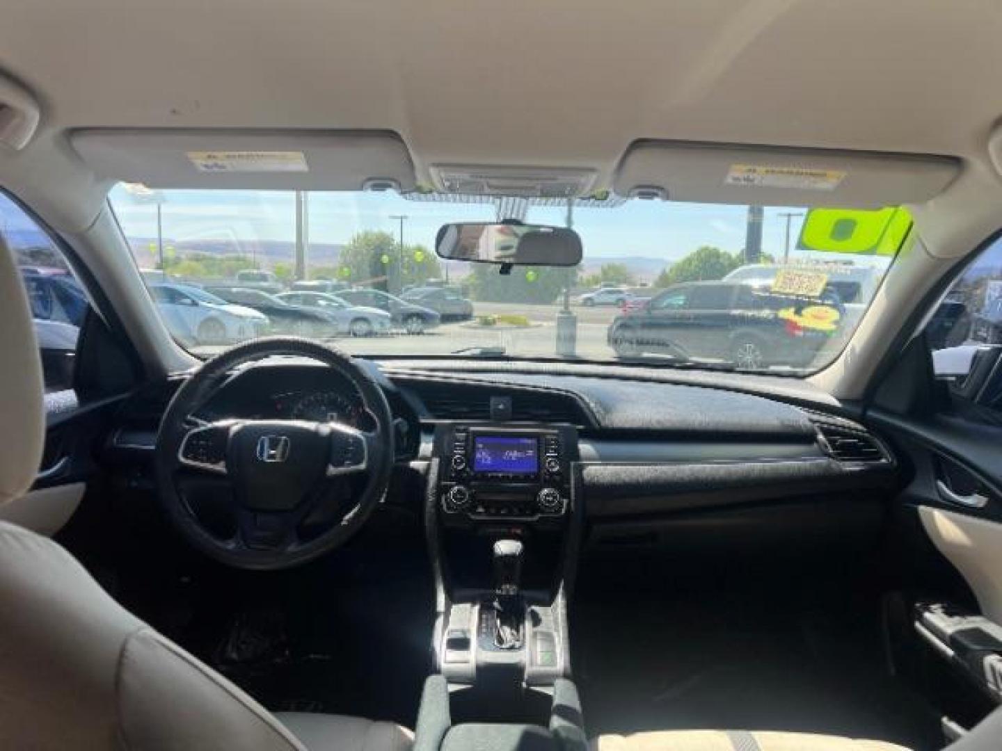 2016 Taffeta White /Ivory Honda Civic LX (2HGFC2F52GH) with an 2L I-4 DOHC engine, Automatic transmission, located at 1865 East Red Hills Pkwy, St. George, 84770, (435) 628-0023, 37.120850, -113.543640 - We specialize in helping ALL people get the best financing available. No matter your credit score, good, bad or none we can get you an amazing rate. Had a bankruptcy, divorce, or repossessions? We give you the green light to get your credit back on the road. Low down and affordable payments that fit- Photo#21