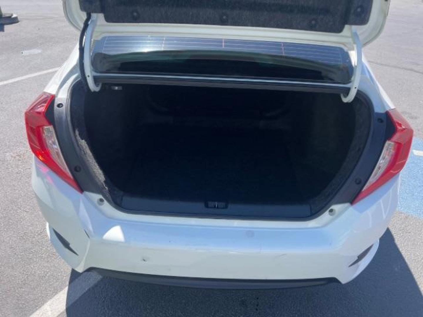 2016 Taffeta White /Ivory Honda Civic LX (2HGFC2F52GH) with an 2L I-4 DOHC engine, Automatic transmission, located at 1865 East Red Hills Pkwy, St. George, 84770, (435) 628-0023, 37.120850, -113.543640 - We specialize in helping ALL people get the best financing available. No matter your credit score, good, bad or none we can get you an amazing rate. Had a bankruptcy, divorce, or repossessions? We give you the green light to get your credit back on the road. Low down and affordable payments that fit- Photo#22