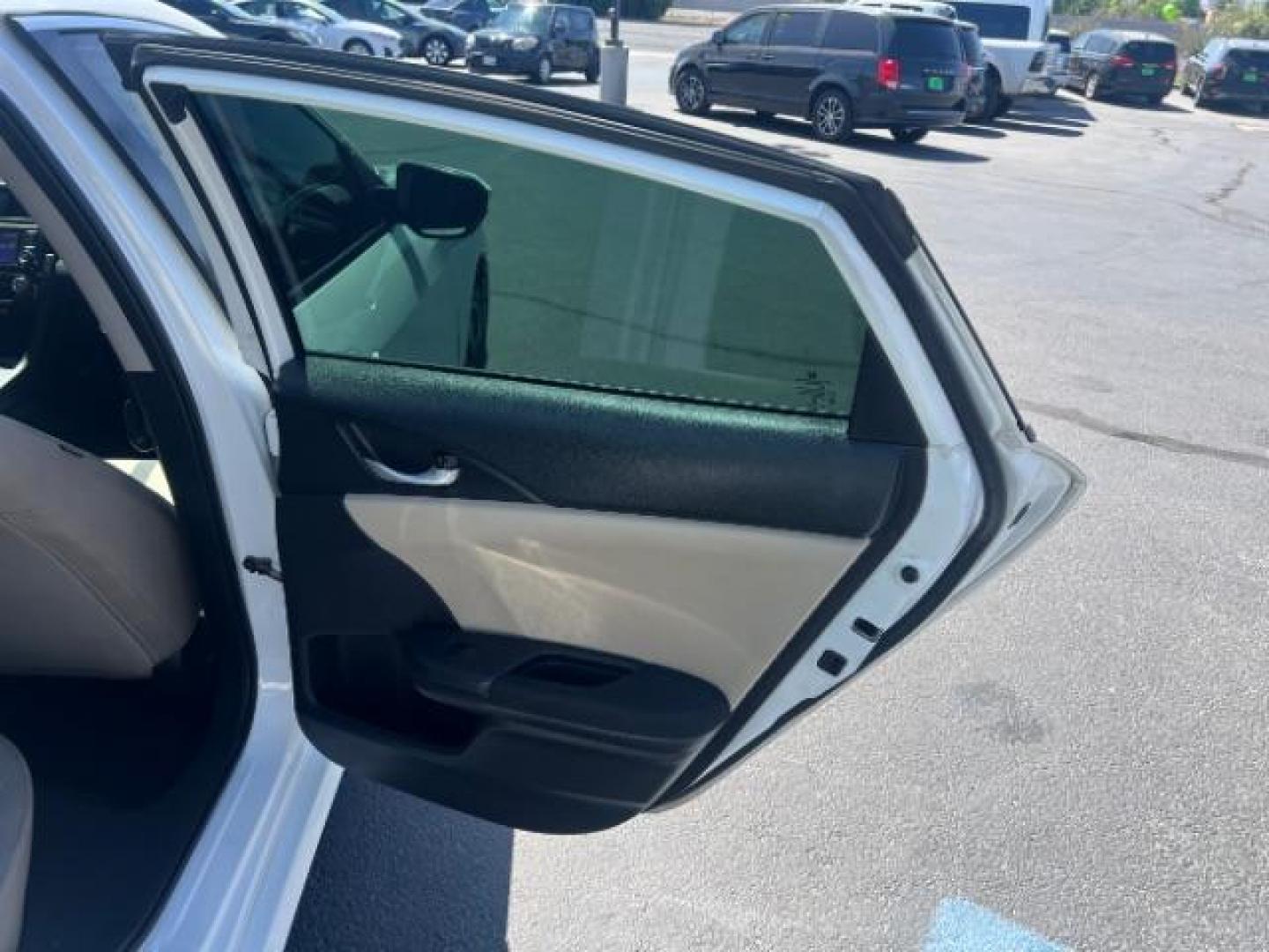 2016 Taffeta White /Ivory Honda Civic LX (2HGFC2F52GH) with an 2L I-4 DOHC engine, Automatic transmission, located at 1865 East Red Hills Pkwy, St. George, 84770, (435) 628-0023, 37.120850, -113.543640 - We specialize in helping ALL people get the best financing available. No matter your credit score, good, bad or none we can get you an amazing rate. Had a bankruptcy, divorce, or repossessions? We give you the green light to get your credit back on the road. Low down and affordable payments that fit- Photo#23